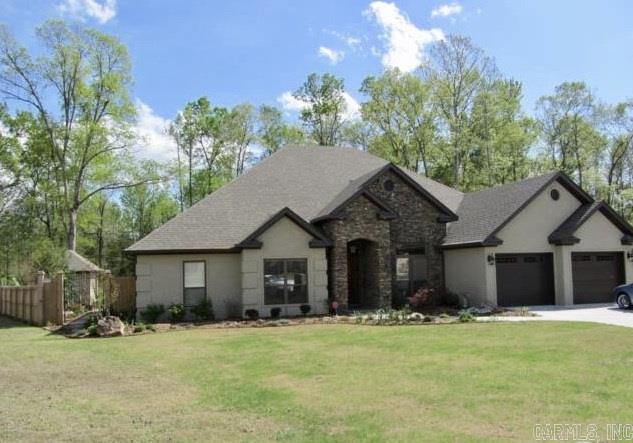 BRICK & Stone Exceptional custom built 1 level on quiet cul-de-sac. In-law-Qtrs w/ sep entrance. Spacious & open greatroom & hearth area w/ stunning eat-in kitchen. Custom cabinetry, island, granite countrs, SS Kit-Aid appl, 5 burner gas stove, Din. Rm, Split BR w/ lg mstr suite & lux BA. Beautiful hickory hand scraped hdwds, cent vac. Fireplace & Ext of hm feature native AR stone. Cov. patio, salt syst pool & 11'X16'9" poolhouse/workshop. Backs up to green belt w/ trails. Nice playground nearby