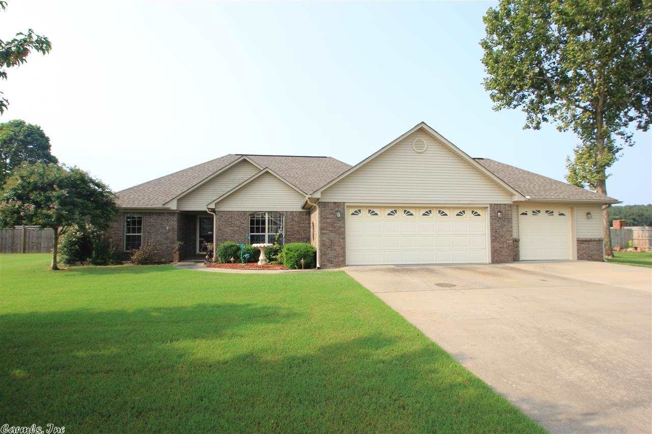 This lovely home sits on a corner 1/2 acre lot with curb appeal. Almost new stainless steel appliances, granite throughout, beautiful hardwood floors, wheelchair accessible shower in master, sunroom and so much more!