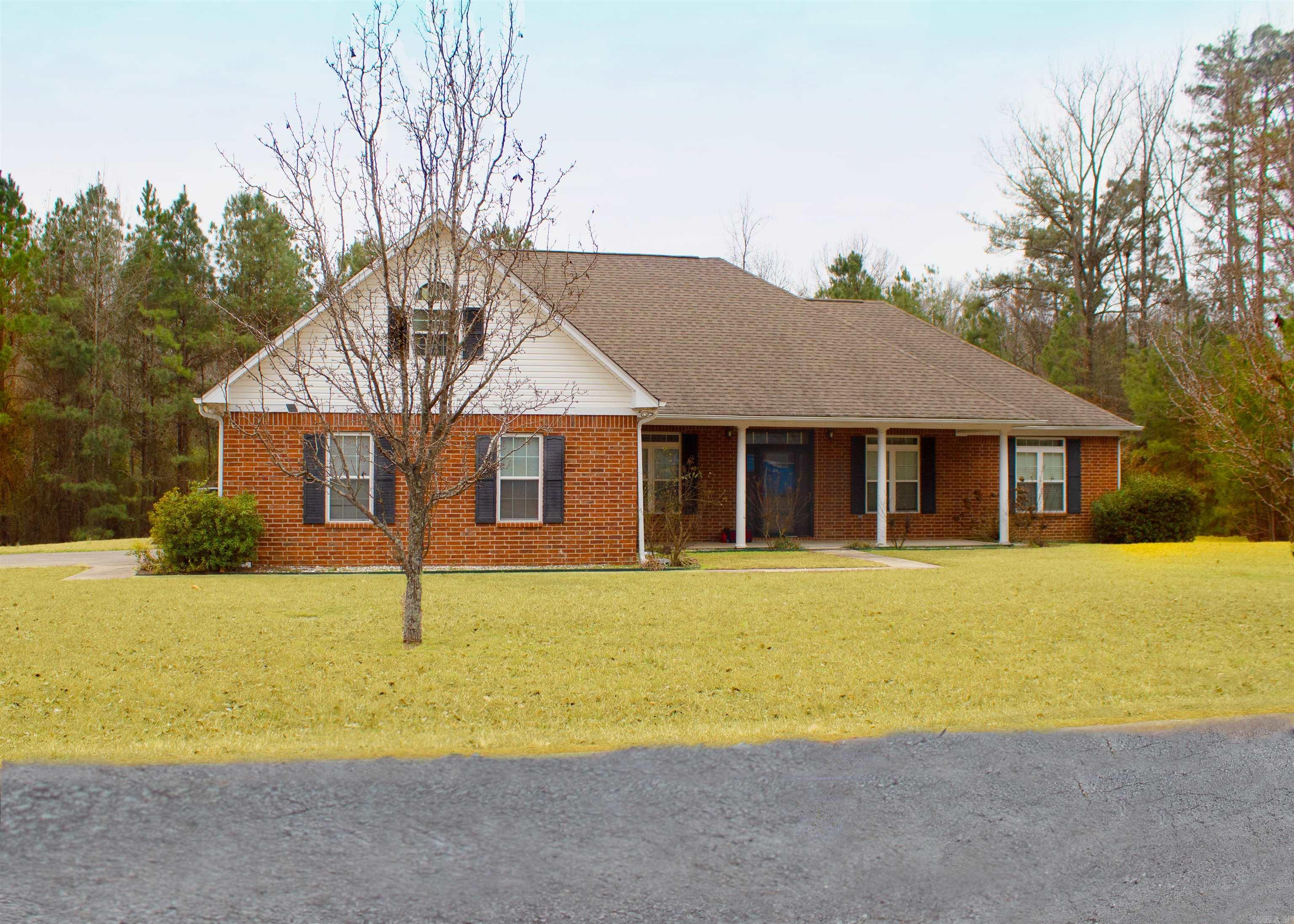 Stunning 2,550 Sq. Ft. Home on 3 Acres This beautiful 3-bedroom, 2.5-bathroom home blends luxury and practicality, offering 2,550 sq. ft. of living space on a 1-acre lot with 2 additional acres. Featuring spacious living a floors, and vaulted ceilings, this home is perfect for modern l Suite: A peaceful retreat with a coffered ceiling, office space, double walk-in closets, and a luxurious bath with a glass shower, jetted tub, and dual vanities. Livi Room: A grand space with a custom wood mantel, tiled fireplace, and built-in shelving. Dining Room: Spacious with seating for 10, large windows, and a built-in seating area. Kitchen: Chef’s kitchen with granite countertops, soft-close cabinets, slide-out pantry, and high- end stainless steel appliances. Cozy breakfast nook included. Laundry Room: Spacious with tiled counter space, washer/dryer, and ample storage. Additional Bedrooms: Two large bedrooms with walk-in closets, hardwood floors, and flexibility for family, guests, or a home office. Garage &amp; Parking: Two-car garage plus extra outdoor parking. Set on 3 acres, this home offers privacy, room to grow, and modern comfort, all while being close to local amenities.