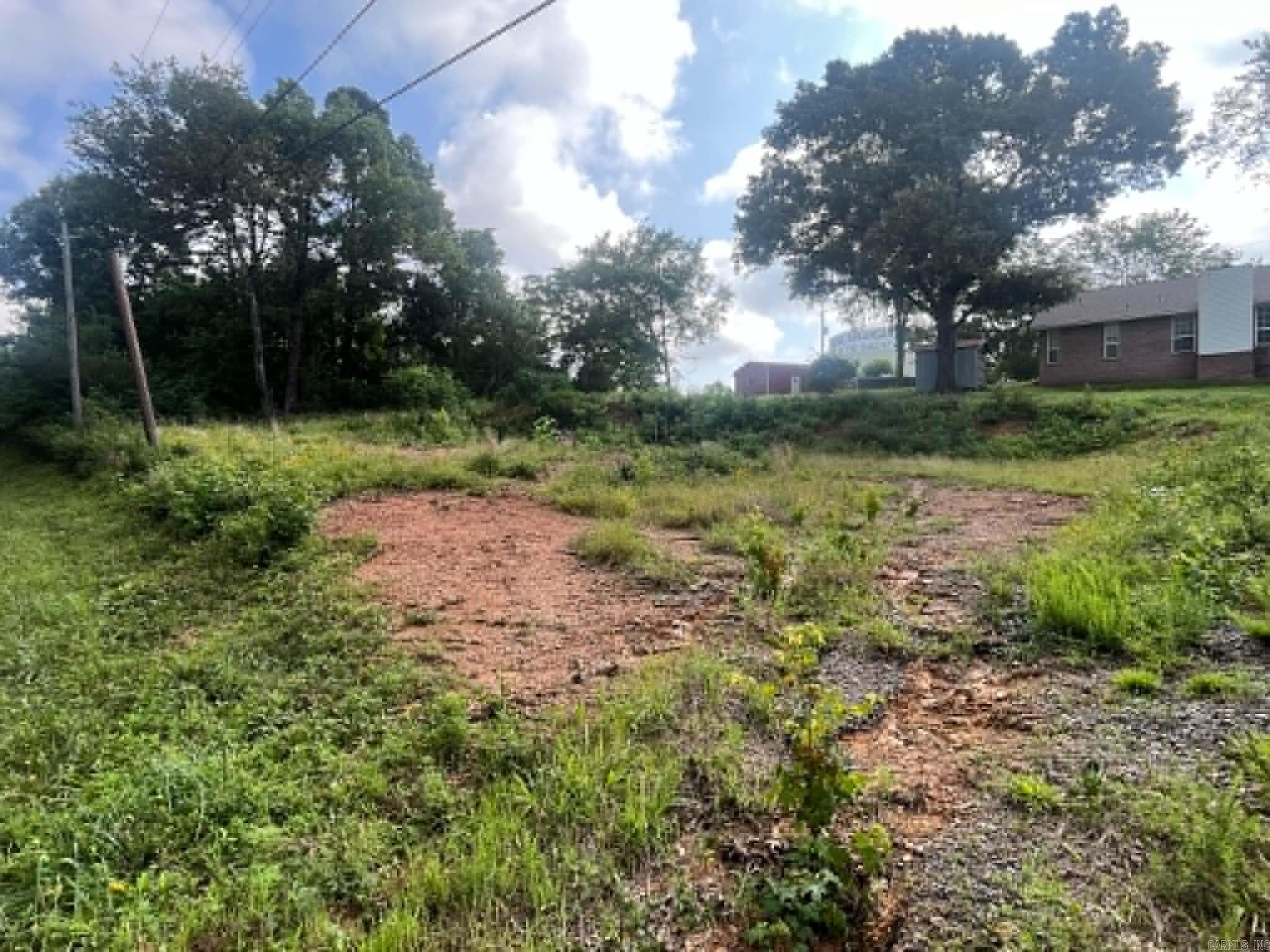 Nice lot to develop on quiet street. Great investment property. Very close to downtown Mena.