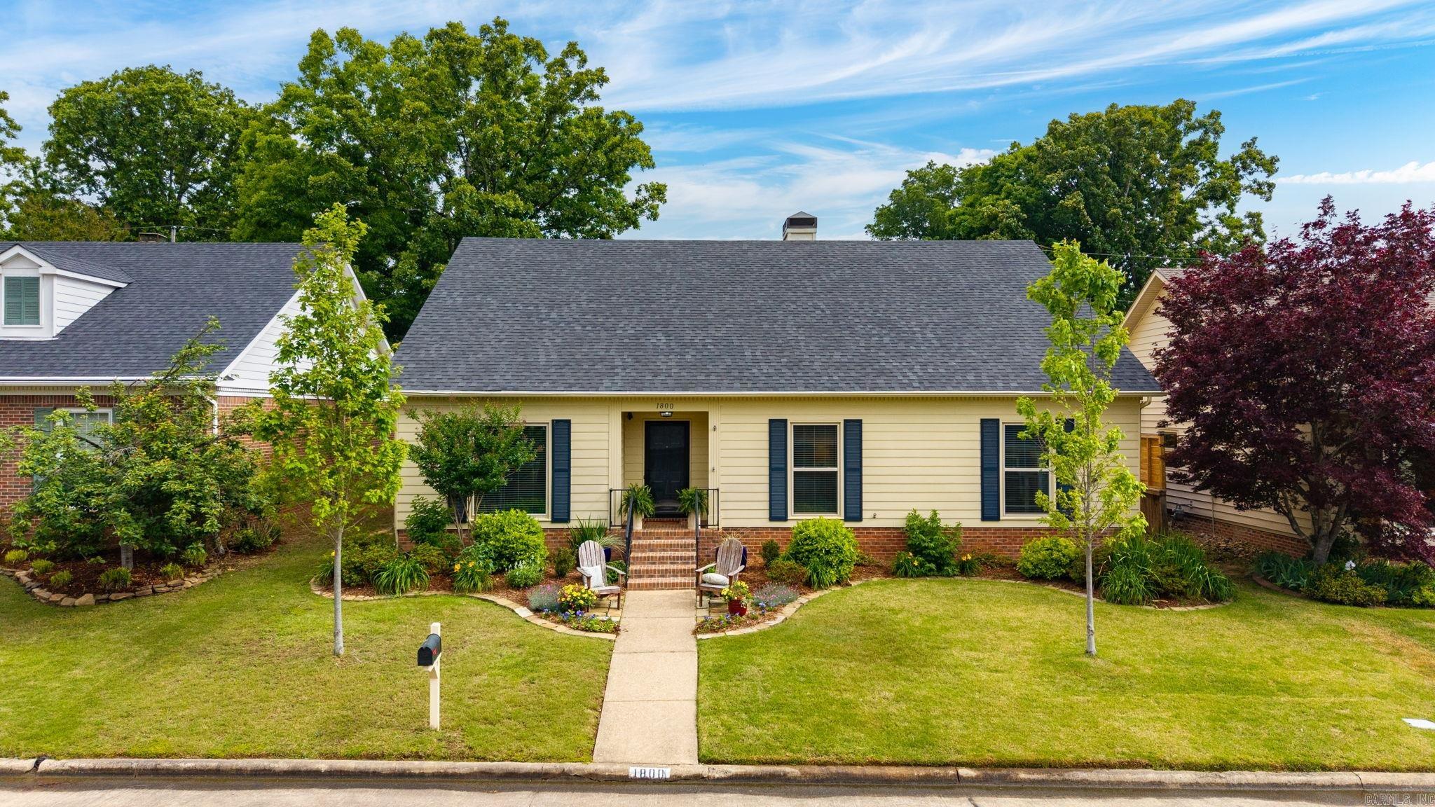 Welcome to this stunning one-level home tucked away on a quiet cul-de-sac in the heart of West Little Rock. This 3-bedroom, 2-bath home is truly move-in ready. Enjoy the fully remodeled kitchen with granite countertops, tile floors, custom cabinetry, and new appliances (2024). The living room is ideal for entertaining, complete with an updated mini bar, wood-burning fireplace with gas logs, and views of the private backyard. The dining room is currently being used as a home office, and an additional flex space at the front of the home provides the perfect option for a second living area. The light-filled primary suite overlooks the backyard and features a walk-in shower, dual vanity, & walk-in closet. Both bathrooms have been thoughtfully updated. Step outside to enjoy a partially covered tile patio surrounded by professional landscaping—perfect for outdoor enjoyment. A two-car garage adds convenience & extra storage. Major updates include a new roof (2025), HVAC and ductwork (2022), new flooring throughout (2024), & new windows (2020, excluding the 3 large rear windows). This home offers modern updates, functional living spaces, and the perfect location—ready for you to enjoy.
