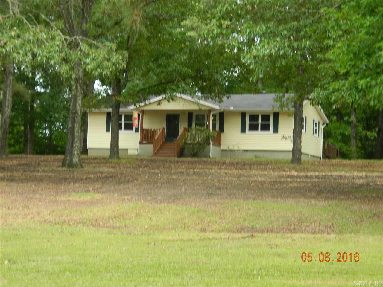 Price Reduced!!!  Small Charming Country Home,  Fresh New Paint in Living Room and Kitchen, Granite counter tops, New Appliances Tile And  Laminate Floors, 3 Bedrooms 2 Baths, , Large Deck. There is also A Wonderful 2 Car Garage/ Shop, All sitting on 5 Acres, mostly wooded, Beautiful Setting.  MOVE IN READY!!!