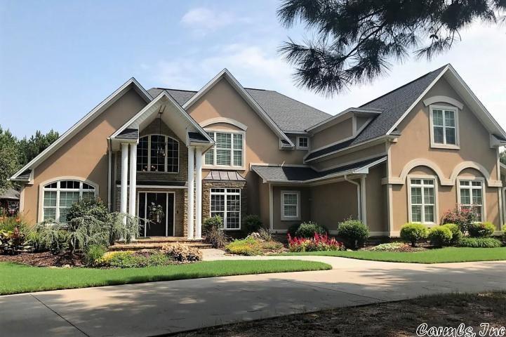 The minute you pull through the front gate & drive down the tree lined drive, you will recognize the true craftsmanship, class & style of this beautiful home, set among 7.57 private well manicured acres. Main house boasts 5 bedrooms, living area with tall ceilings, open balcony, large den with cedar ceilings & fireplace, theater room, & custom kitchen fit for a master chef. Escape to a personal oasis pool w/ water slide & custom rock work & separate guest quarters w/ kitchenette. PLUS 30x40 workshop & more