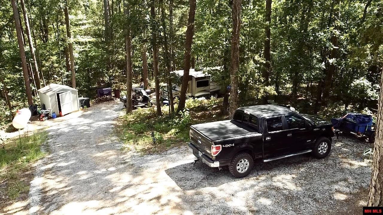 Wooded lot on the outskirts of Calico Rock, AR.  Private and has building site, as well as, RV pad.  Property is minutes away from the famous White River & Norfolk Lake
