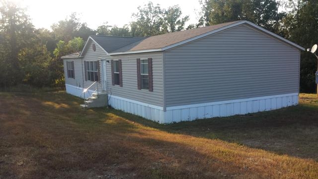 Three Bedrooms, one full and a half bath, wood and vinyl floors, enclosed patio  and big  yard are some of what you will find here. There are enhancements needed to get this home move in ready. Take a look today, see what you can accomplish here. Listing Broker and Seller assume no responsibility and make no guarantees, representations, warranties (express, implied or otherwise) as to the availability or accuracy of information contained herein.