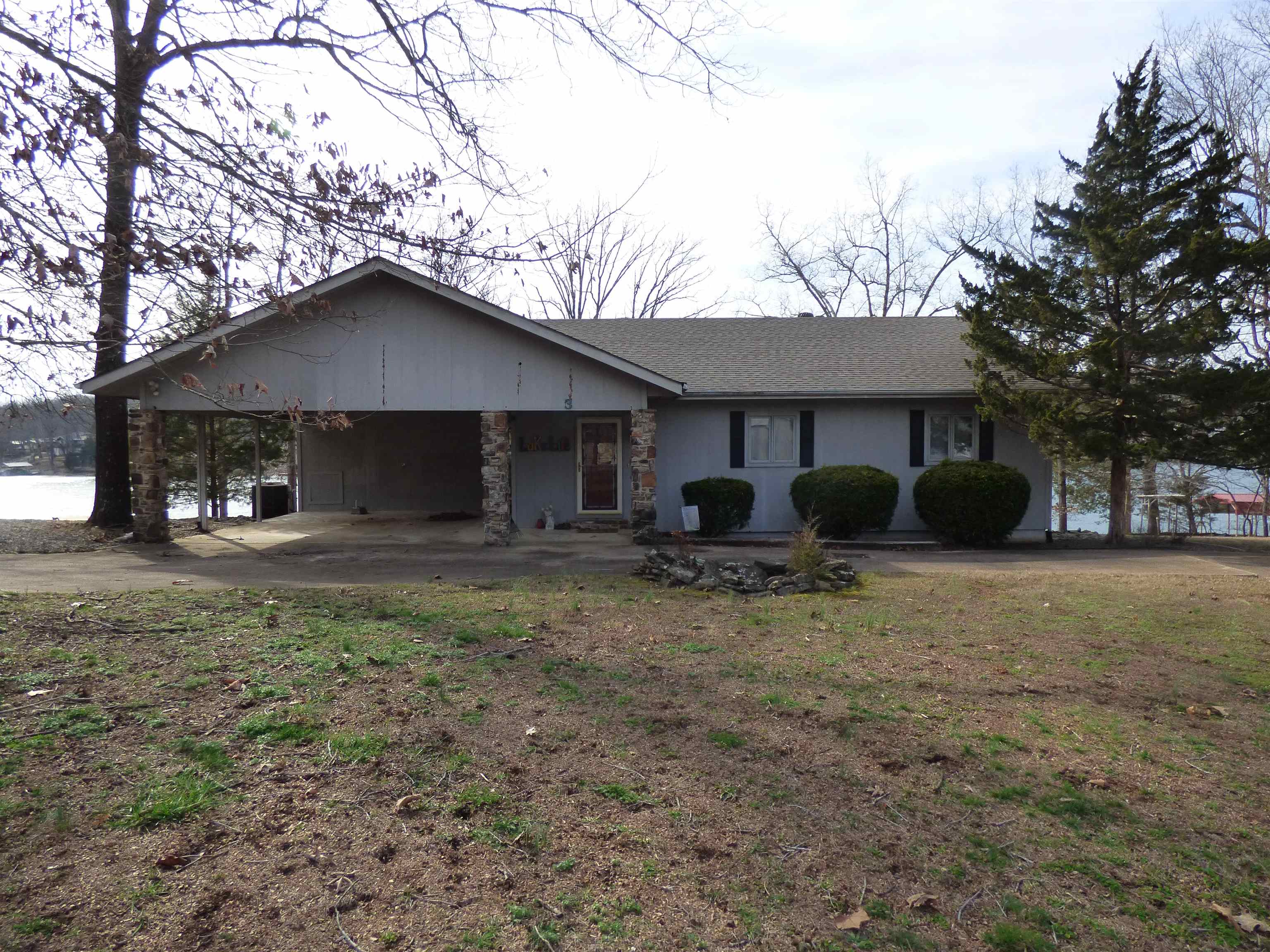 Imagine morning coffee looking out onto beautiful Lake Thunderbird. This 3 bed 3 bath home with an expansive patio area boasts a beautiful boat slip making it easy to park your pontoon.  The spacious downstairs is perfect for hosting friends and family, or making a private suit where guests can have their own get away area that walks right out to the lake.  Lots of natural light throughout the house and plenty of access to the outdoors. Tons of storage space for all of your lake toys and extra's!  Don't miss out on this gorgeous property, call and schedule your tour today.