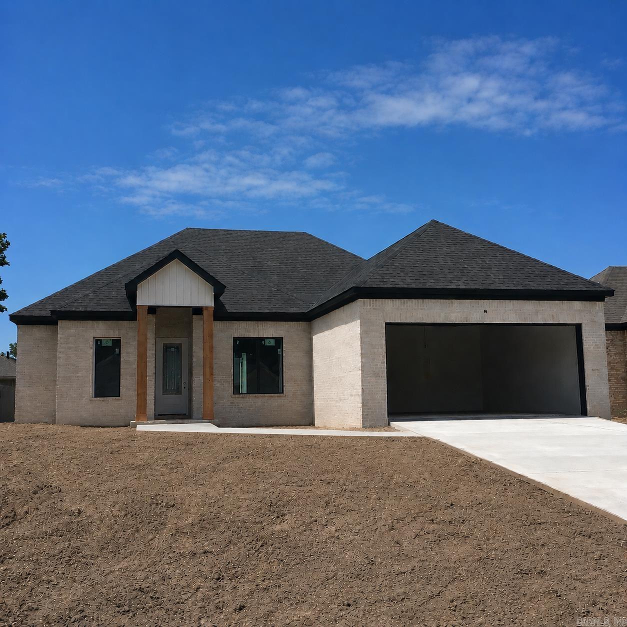 Stunning all-brick WLR new construction sits on a level lot near the end of a large cul-de-sac lot. It offers privacy and a peaceful setting. Inside, there are 11-foot ceilings in both the entry and living areas.  The remainder of the home features 10-foot ceilings, which creates an open, airy feel throughout.  The light-filled great room flows seamlessly into the well-designed kitchen, complete with a large walk-in pantry.  This home has a dedicated office or study, and the layout offers flexibility for work and everyday living.  The 15 x 14 primary suite feels like a private retreat, featuring a spa-inspired bathroom with a tub, separate shower, and dual sinks.  Enjoy outdoor living on the spacious covered patio. Built by a trusted builder with over 30 years' experience.   This home blends quality craftsmanship with a thoughtful design. Nearing Completion. Call for your appointment today!  #New Home#DreamHome!