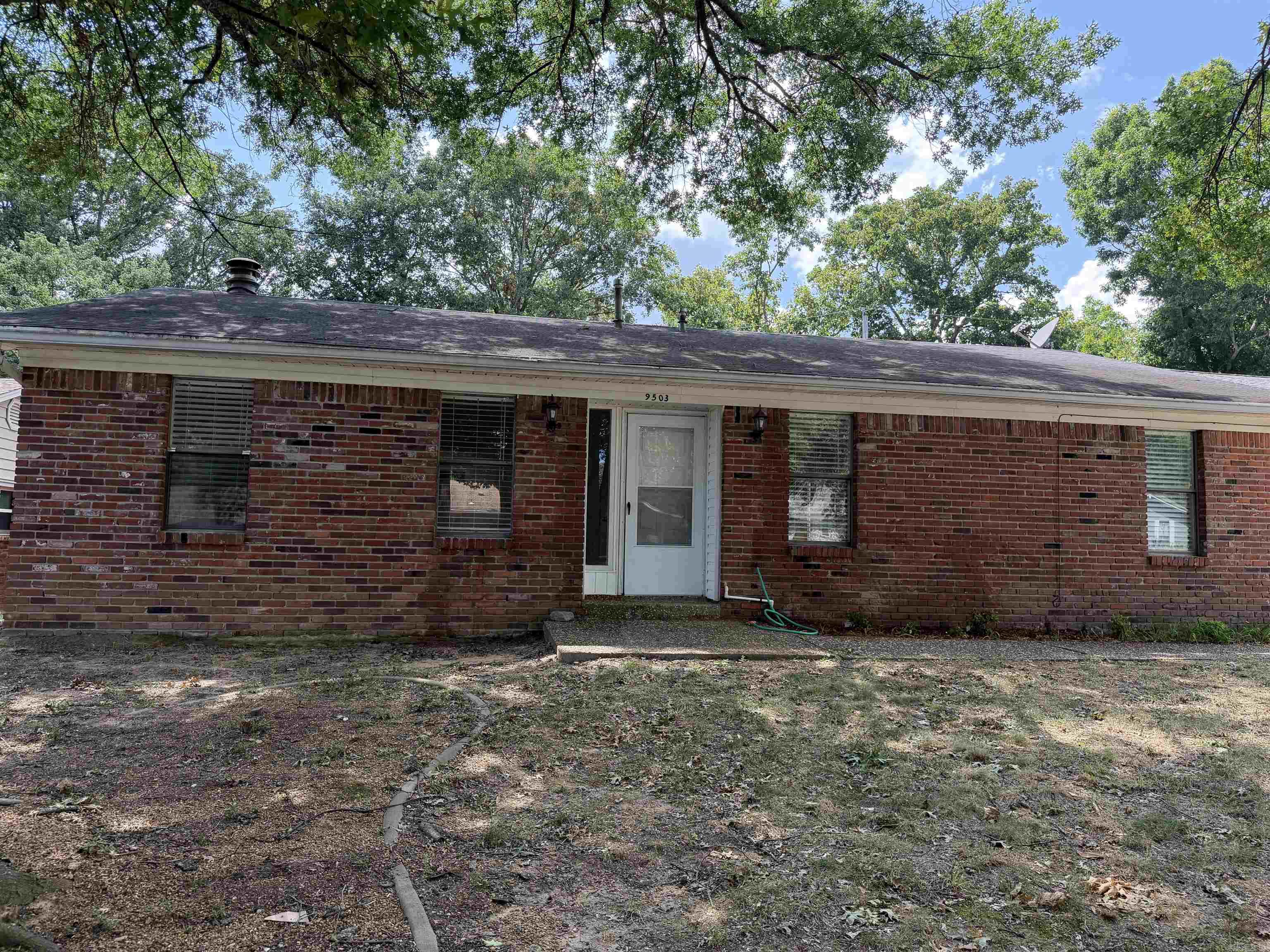 Almost everything inside the house has been replaced. New deck. All new kitchen and baths, new flooring, new paint, new lightings new appliances.  Like a new house in a established neighborhood.  Garage is in the back with long drive way  Low maintenance yard.