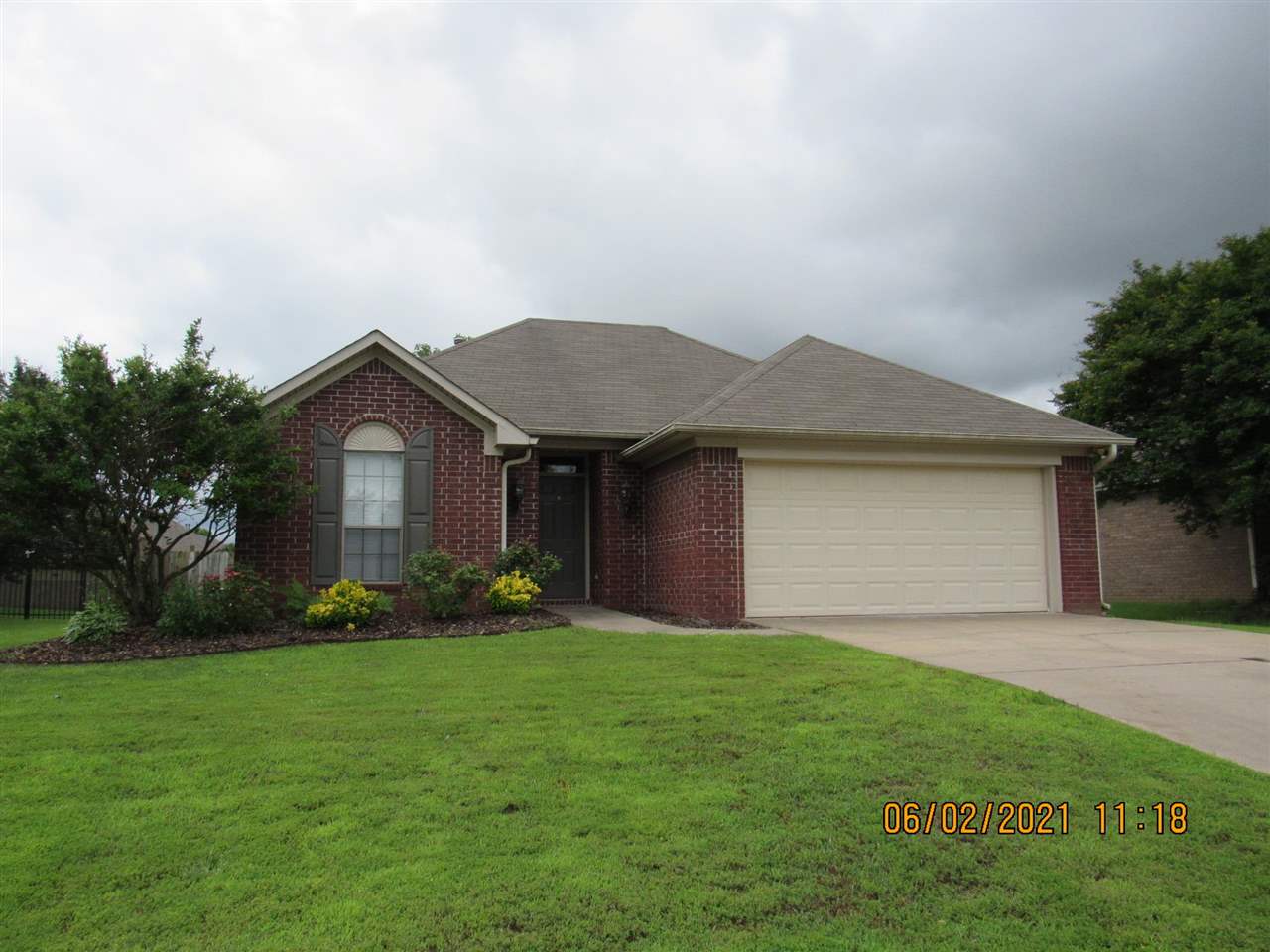 Well maintained 3 bedroom home, oversized family room with laminate floors & vaulted ceiling, laminate & tile floors throughout, 2 inch blinds throughout, all kitchen appliances including refrigerator, separate laundry area with hook-ups, 2 car garage, fully fenced yard, large patio. No Pets.