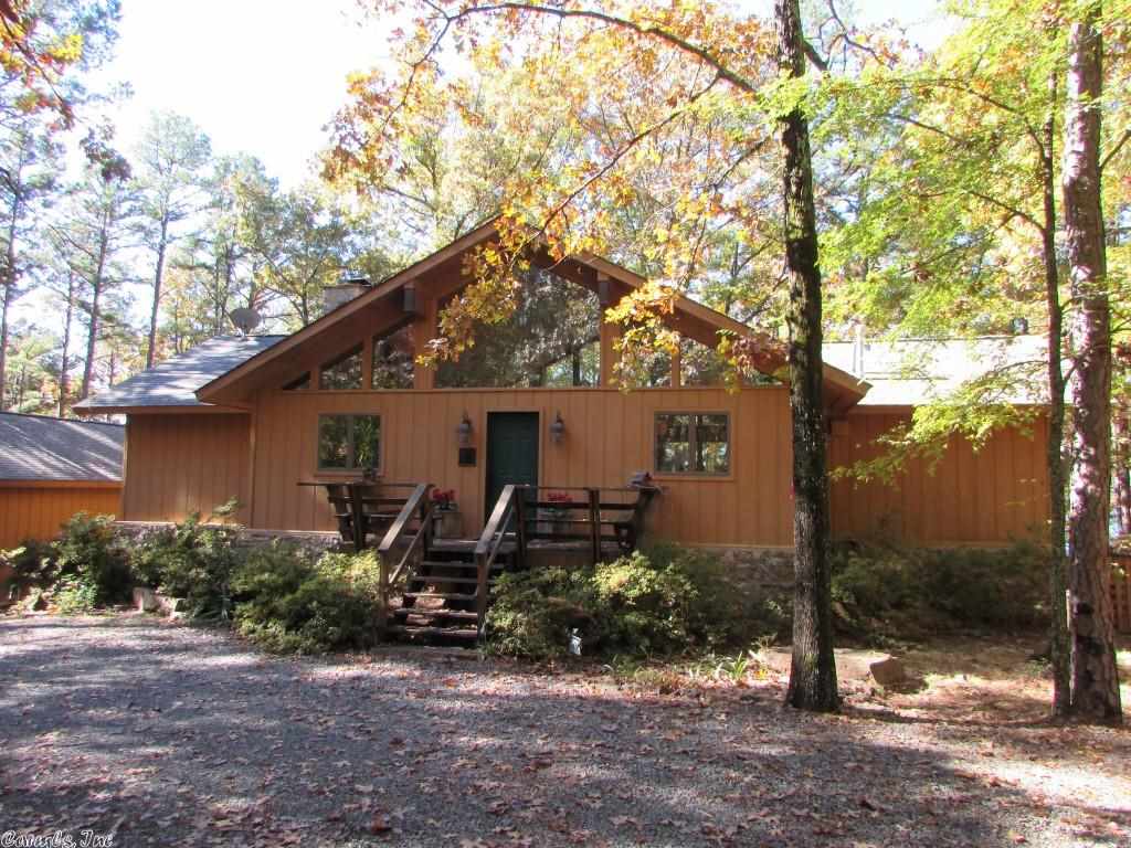 Fantastic lake home with private boat dock.  Easy walk to water with nice view of open water. 4 bedroom, 4 bath, vaulted ceilings, two fireplaces, large deck. You can see the lake from every room in the house. Fully furnished !