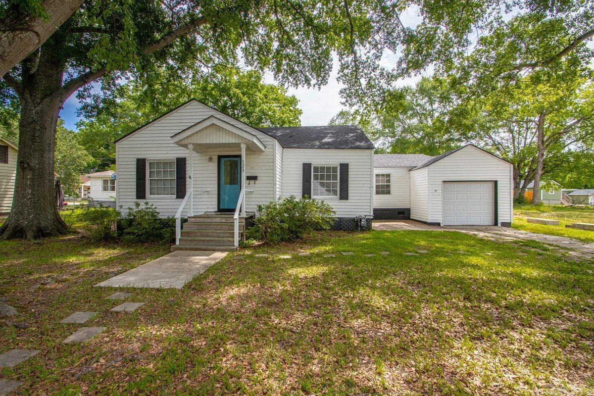 Charming 3 bedroom 1.5 bath home nestled in the heart of downtown Benton!  Full of character and warmth, this home features original hardwood floors and timeless charm throughout.  Conveniently located near shopping, dining, schools, and local amenities, this property offers the perfect blend of classic appeal and everyday convenience.  Whether you're looking for your first home, an investment opportunity, or a place close to all that downtown has to offer, this one is a must see!
