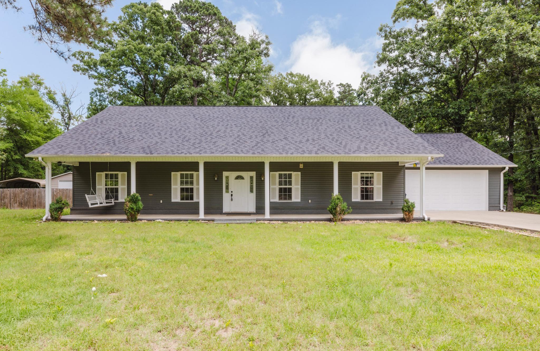 Beautifully updated 3BR/2BA home located outside the city limits! This expansive property has been fully renovated from top to bottom and features an updated (2023) HVAC system, roof and flooring throughout. The kitchen has been fully remodeled with granite countertops, new dishwasher, and garbage disposal. Both bathrooms have been completely updated with tiled showers and new vanities. Additional features include an oversized garage with extra storage room, partially fenced backyard, covered patio area, and walkway leading to a shop/home gym. The heated and cooled bonus room off the kitchen makes the perfect home office, playroom, or flex space. Eligible for $0 down with Rural Development financing. Schedule your showing today to see all this home has to offer.