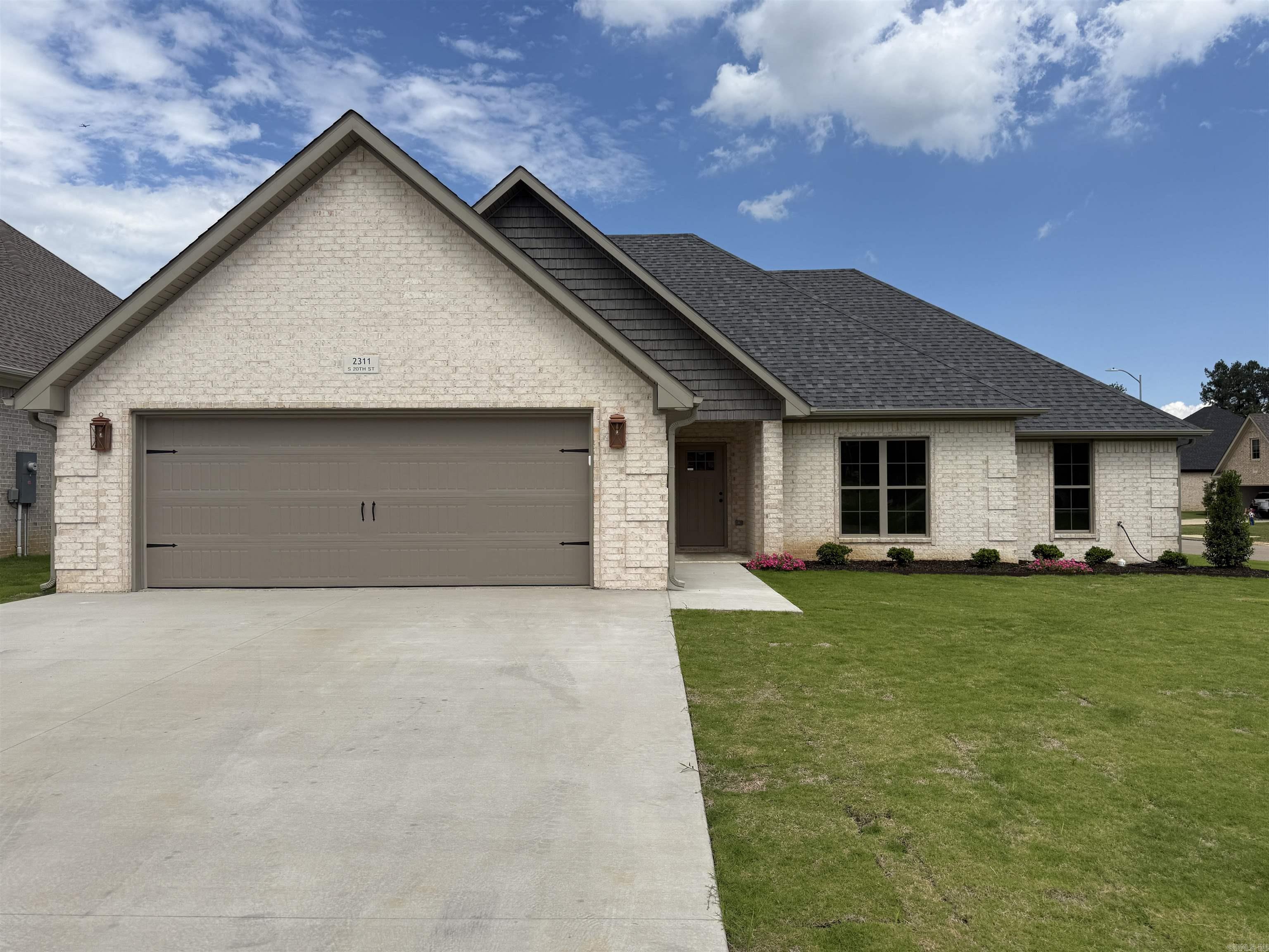 Let this new construction home be yours with corner lot, double garage and all the extra features of a custom build, I can't wait to show you the finished product! Four well appointed bedrooms, guest suites apart, hall bath, pantry, laundry, stainless appliances, luxury plank vinyl flooring, landscaping and sod yard. What are you waiting for? This island kitchen is going to knock your socks off...so call and view this one today.