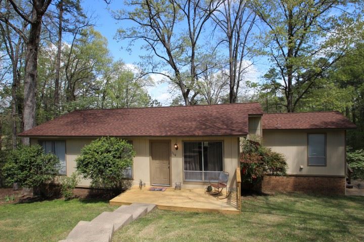 Quiet & Peaceful with Little Traffic, Abundant Wildlife & Great Neighbors With A Feeling Of Security...that is how the seller describes your new lifestyle ! Surrounded by a forest of trees and many natural elements in your own back yard. Completely updated with hand scraped laminate floors, title, carpet and freshly painted. Your new home is move in ready! Located in Diamondhead, Lake Catherine's Resort gated community. Enjoy Golfing, Boating, Fishing, Skiing, Tennis,Community Pool, Club House Activities