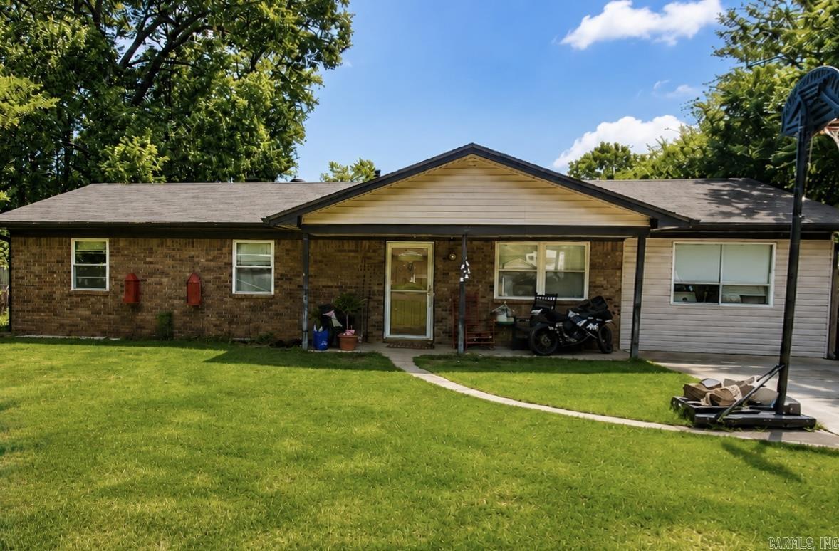 Opportunity awaits at this 3 bed, 1.5 bath home in Benton! With a little TLC, this unique property has great potential! The home offers a functional layout, spacious yard, and a detached bonus building that was previously used as an additional living area. There are endless possibilities for this to be used as a guest space, hobby area, workshop, storage, man cave/she shed etc. Major updates include: New roof, hot water heater& HVAC! Peace of mind knowing all of the big ticket items are taken care of.  Home being sold AS-IS.