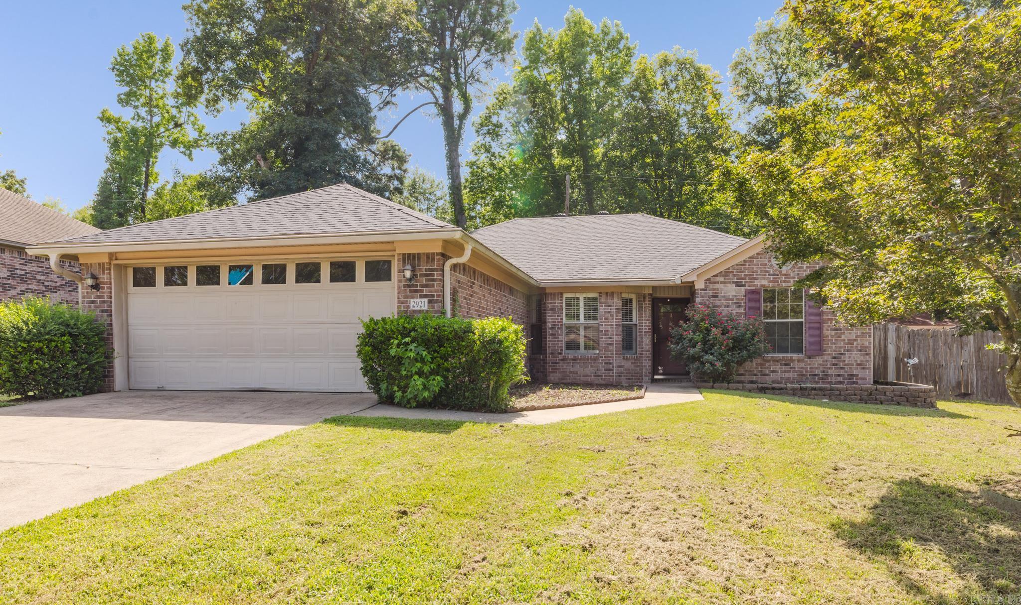 Move-in ready with all the big-ticket updates already done! This well-maintained home features brand-new LVP flooring, fresh paint throughout, a new HVAC (2022), and a new roof (2023). The split floor plan offers privacy, while the primary suite includes double sinks and the living room features a cozy gas log fireplace. Enjoy the fully fenced backyard, plus an outdoor storage building for extra space. Washer, dryer, and refrigerator all convey. The broken garage window is being replaced. Conveniently located close to shopping, dining, and schools, this home is ready for its new owners!