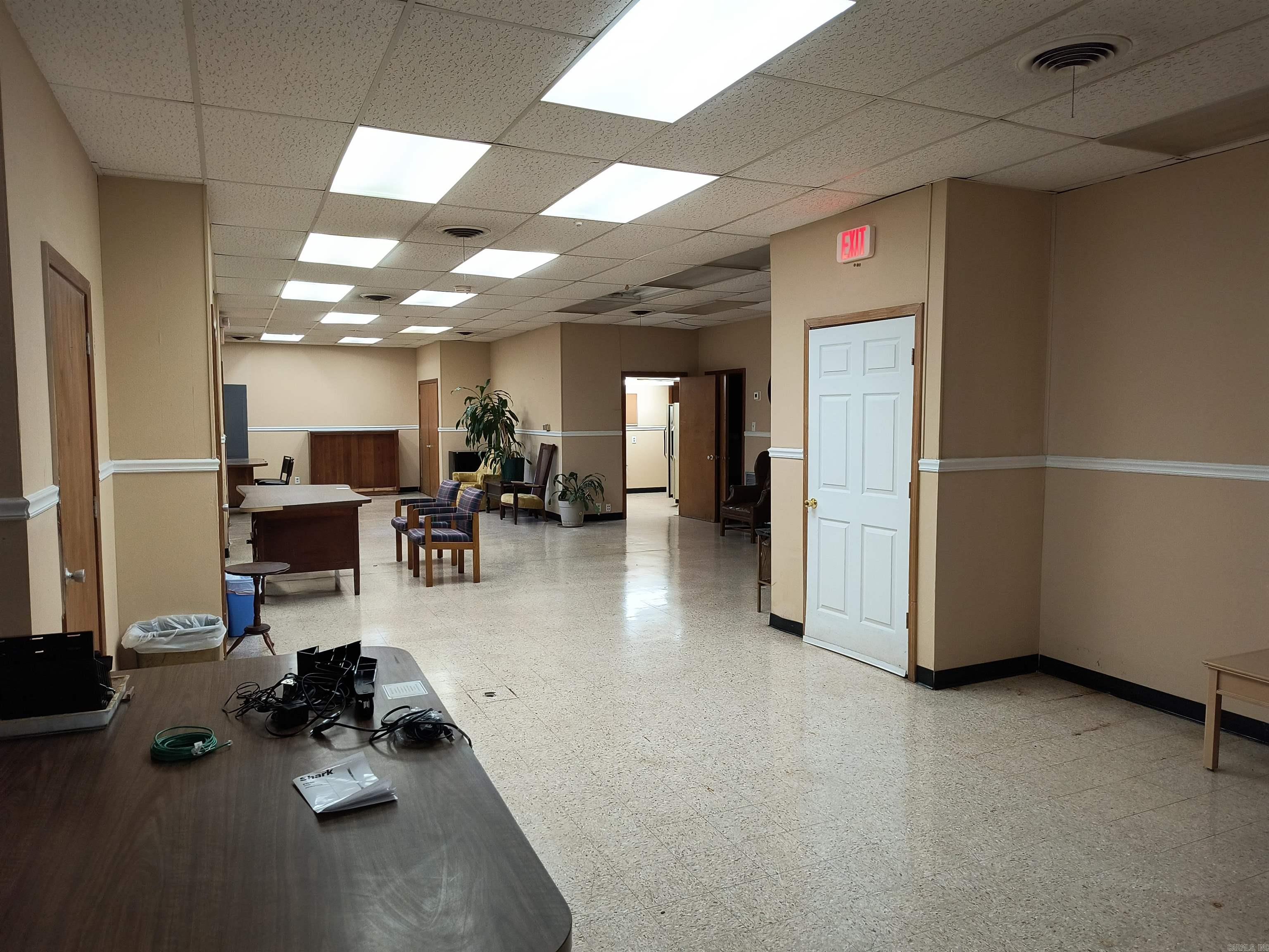 Large open concept office space.  Unit is partially furnished and utilities are paid.  Break room with refrigerator.
