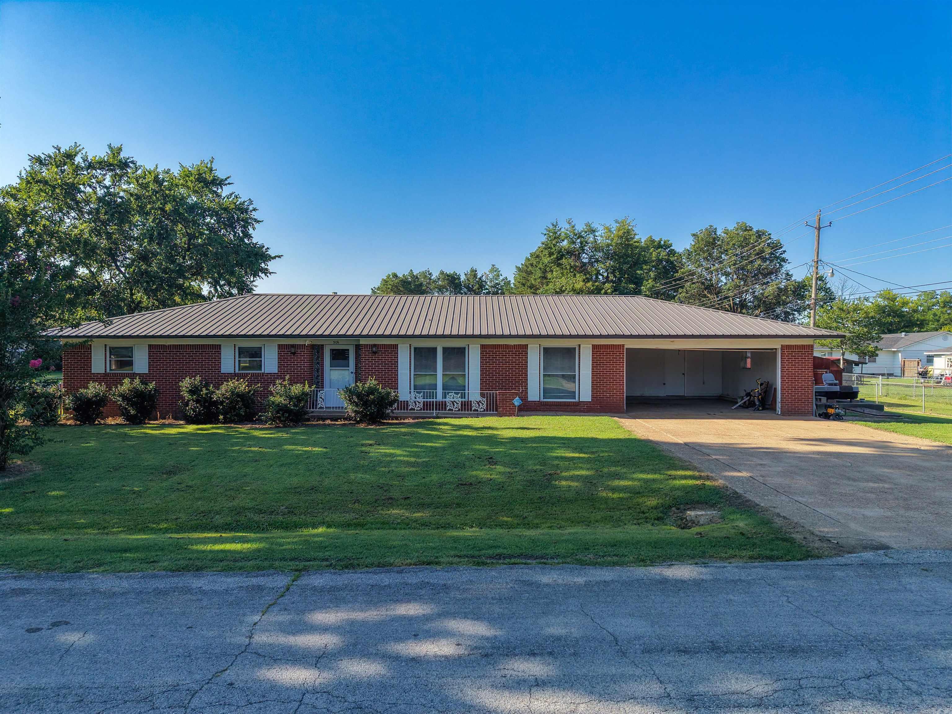 Welcome to the Walnut Ridge market- 306 Arkansas Avenue is ready for its new owners! This home has been beautifully maintained over the years, with just under 1700 square feet of living space. The home sits on a nice corner lot, with a fenced-in backyard within walking distance to Walnut Ridge Schools. A large 2-car garage, utility/laundry room, and lots of additional storage space offer you convenience and comfort. Walking out to the backyard, you're met with a spacious back deck, great for relaxing or hosting gatherings. Additionally, the property provides a storm cellar and a storage shed next to the home- for added safety and convenience! This home has so much to offer, come see it in person!