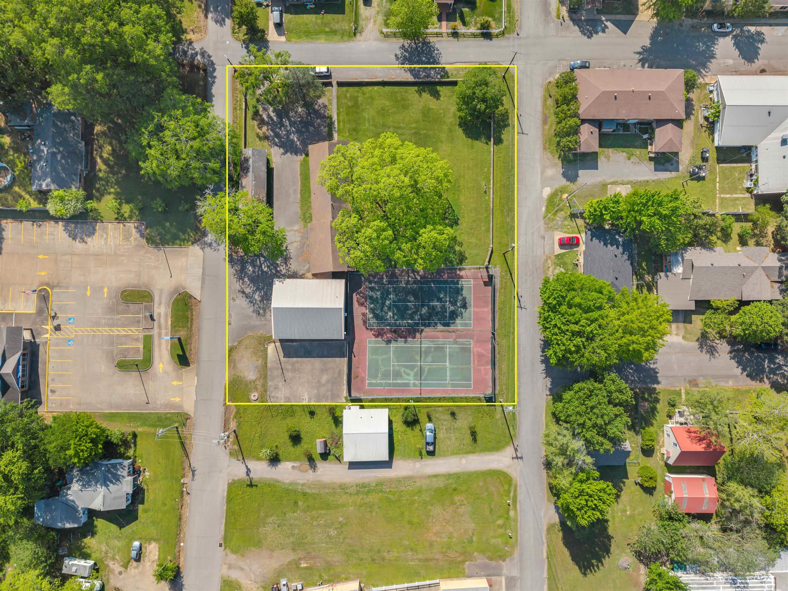 One city acre in the middle of Perryville, AR. A 40'x40' metal building sits on the property and has been used to store equipment for the city in recent years. It was previously the old fire station and has electrical, offices and plumbing. No value was assigned to the old City Hall building.
