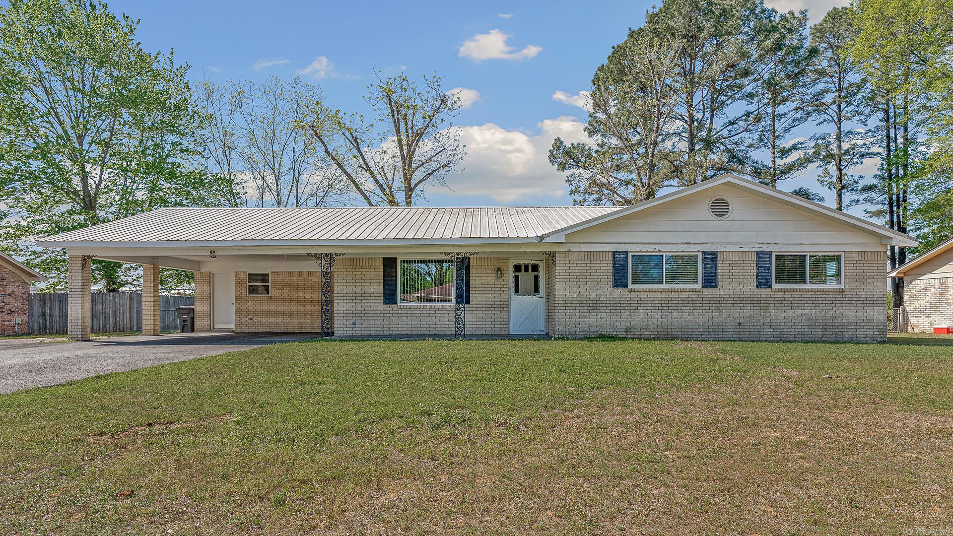 Conveniently located just minutes from Exit 46 in Searcy, this charming 3-bedroom, 2-bath home offers both comfort and accessibility in a quiet, desirable area. Step inside to find new flooring throughout and fresh paint in much of the home, giving it a clean, updated feel. Both bathrooms have been tastefully renovated, providing modern touches and added value. The home also features a durable metal roof, offering long-term peace of mind and low maintenance. Outside, you'll love the fully fenced backyardperfect for pets, kids, or simply enjoying your own private outdoor space. With its great location, recent updates, and peaceful setting, this home is move-in ready and waiting for its next owner!