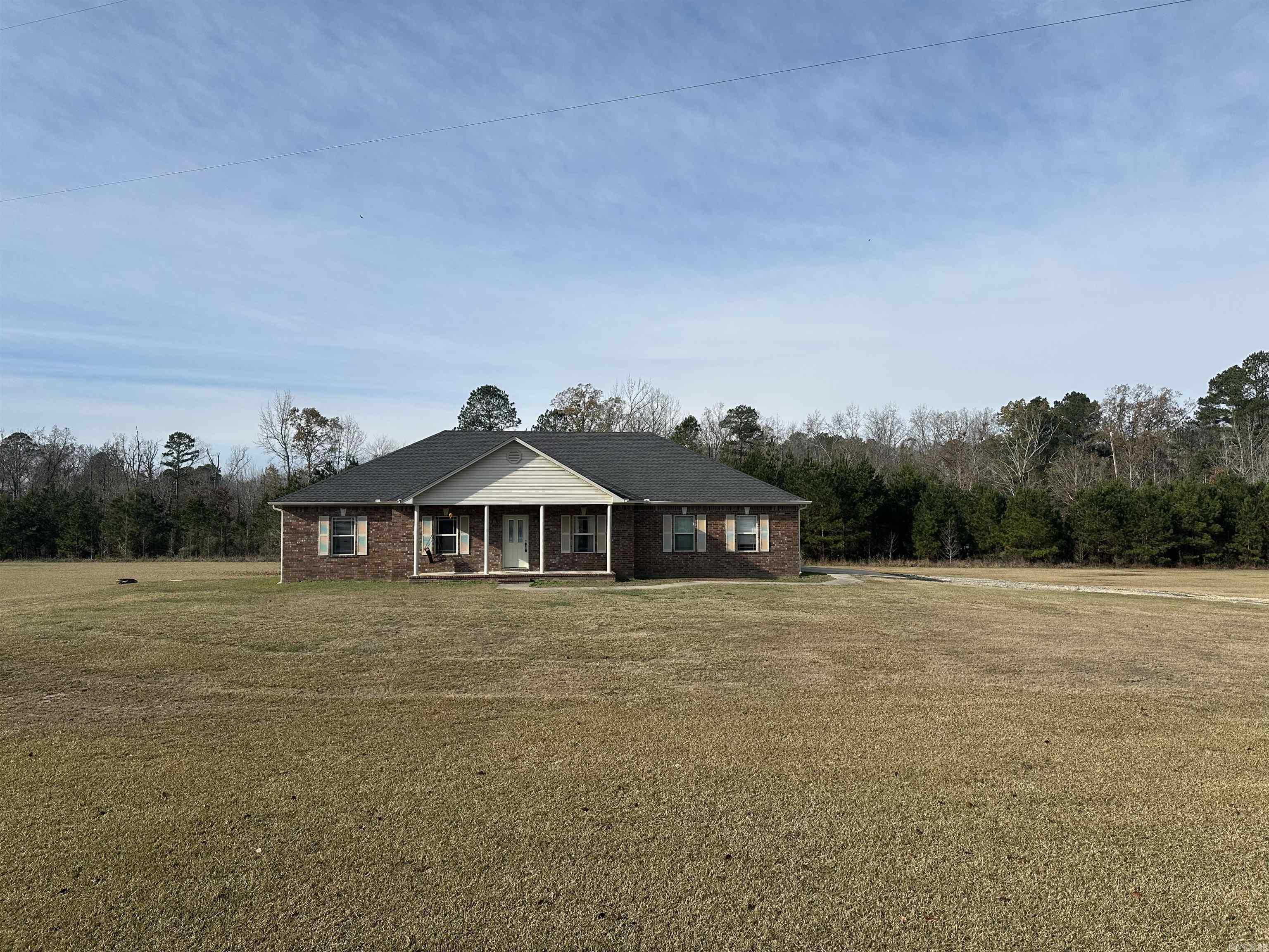 Spacious Custom Home on 3.56 Acres! This beautifully crafted 4-bedroom home sits on a generous 3.56-acre lot, offering space, privacy, and quality throughout. Originally built as a custom home, it’s packed with high-end features that set it apart including real hardwood floors, elegant crown molding, tray ceilings, and a thoughtful split floor plan for added privacy.  You'll love the dedicated dining room, oversized master suite, and the convenience of a 2 car garage. With all bedrooms thoughtfully separated and plenty of room to spread out inside and out this property is perfect for anyone seeking comfort, style, and space to grow.