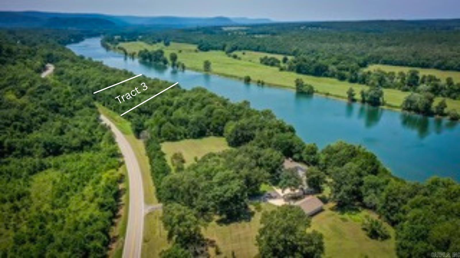Beautiful ready to build 3 acre lot located right on the White River in Locust Grove, AR.