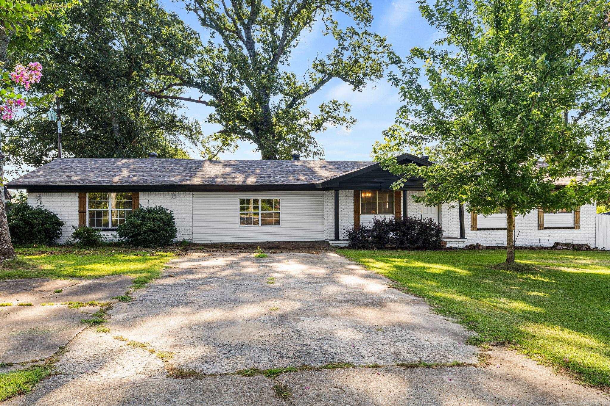Welcome to this beautifully updated ranch-style home offering 2,249 square feet of comfortable living space on a nearly 1-acre lot (0.97 acres). With four bedrooms, two bathrooms, and an open-concept layout, this home is designed for both everyday living and effortless entertaining. Inside, you’ll find like-new cabinetry, gorgeous granite countertops, new flooring throughout, and a full suite of stainless steel appliances, all updated in 2023. Every detail has been thoughtfully refreshed to create a modern, move-in-ready space you’ll love. Enjoy added peace of mind with a young roof and HVAC system, both replaced in 2023. The spacious bedrooms provide plenty of room to unwind, while the oversized laundry room adds convenience to your daily routine. Step outside to a fully fenced backyard with plenty of space to relax, play, or entertain. Nestled in a quiet neighborhood, this home offers the perfect blend of comfort, style, and privacy. Move-in ready and waiting for its next owners—don’t miss your opportunity to make this one your own!