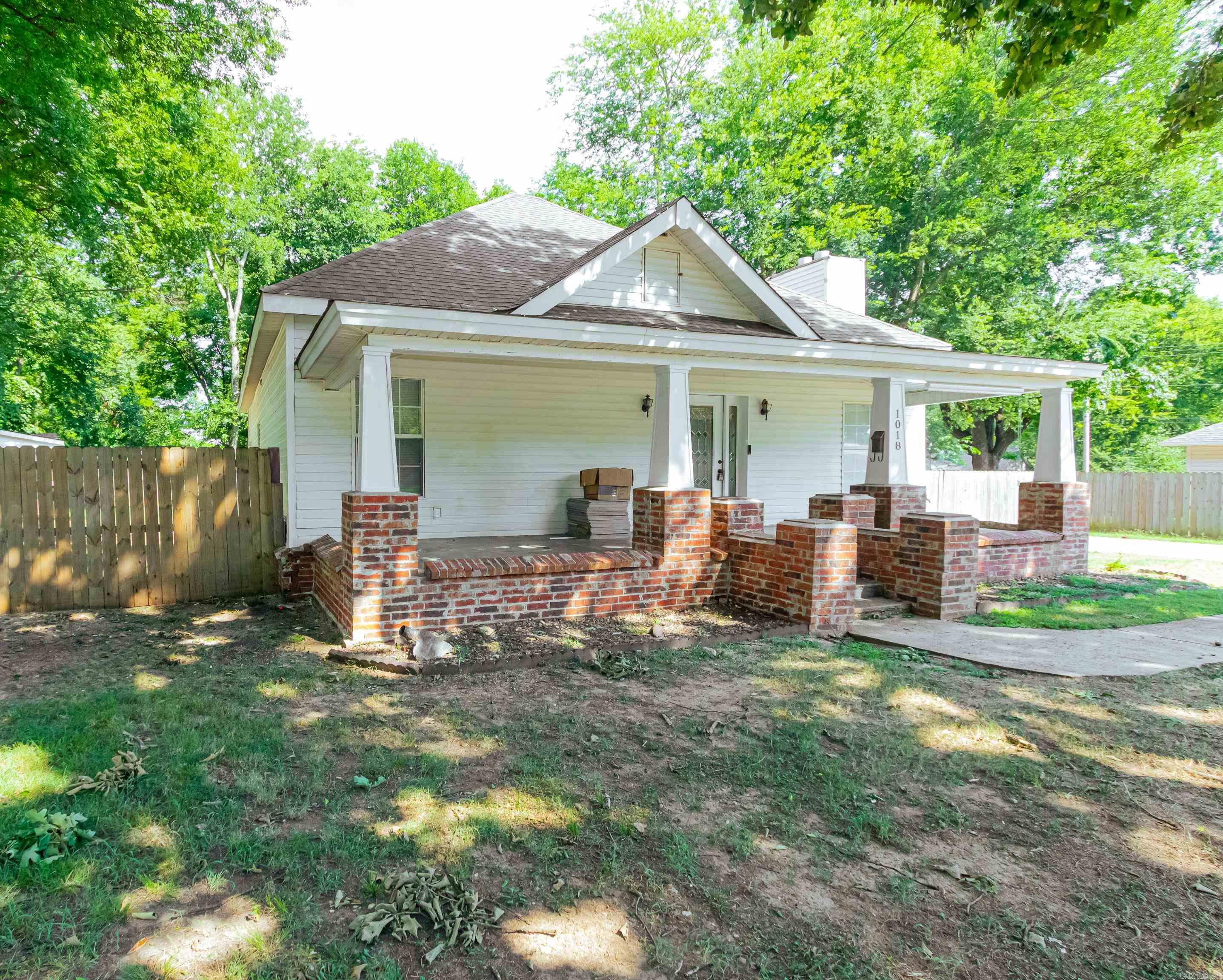 Are you looking to own a piece of history, then look no further. This beautiful home in downtown Benton has 3 bedrooms and NOW 3 full bathrooms that includes 2 ensuites and an open floor plan. It boasts a gorgeous front porch to sip your morning coffee. A large shop in the back open to numerous possibilities from beginning and finishing DIY projects to creating your own man-cave or she-shed. A large back yard with an enclosed fire pit area. And so much more... This rehabilitated home will not last long.  Call today for your showing.