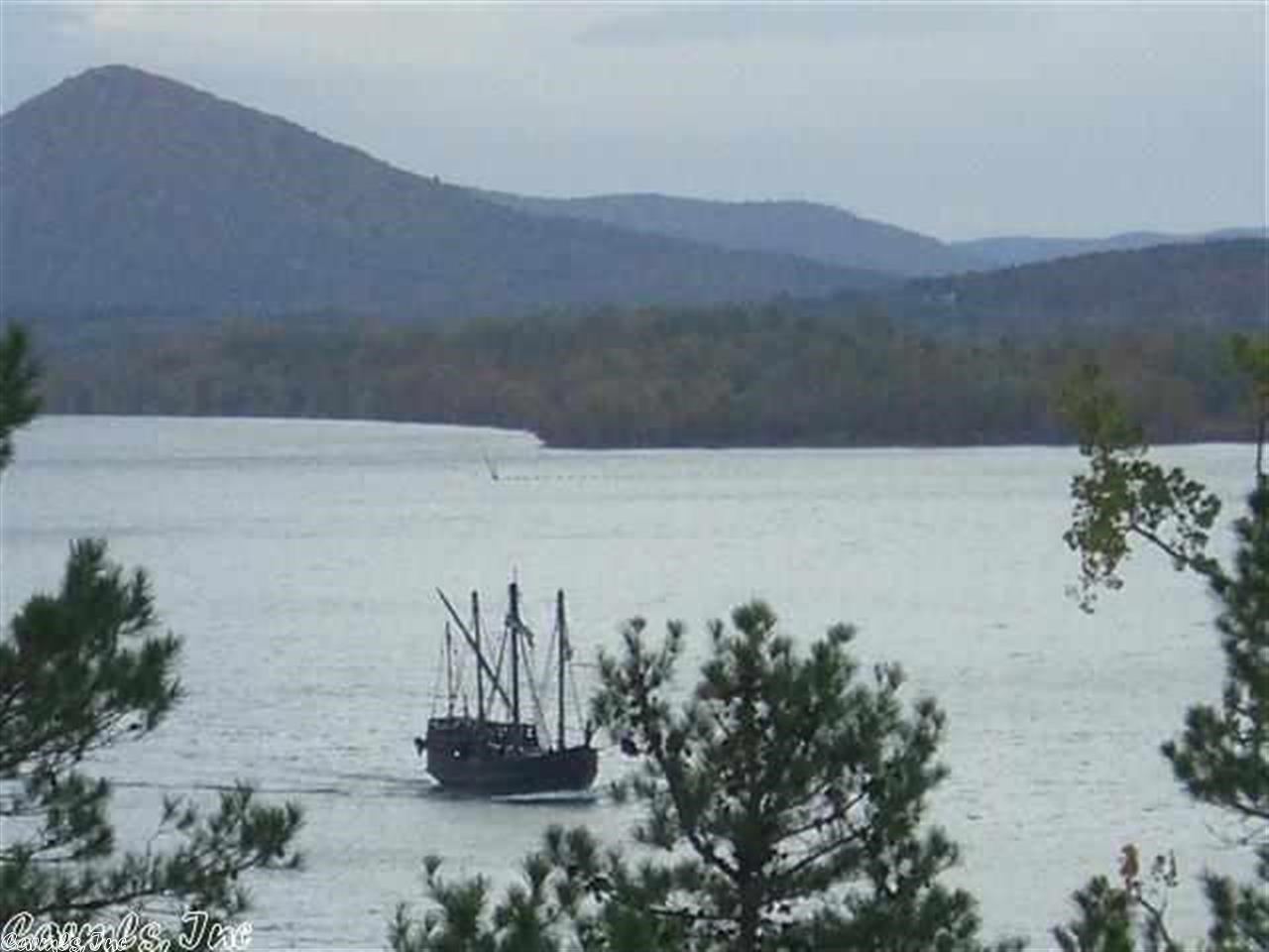 Build your Dream Home!! This amazing tract of land has a view of the Ar River, Pinnacle Mt, Chenal Towers and Mountain Ranges.  Fabulous Sunsets!! It comes with all underground utilities to include; water, electricity, gas, ATT with DSL and sewer. Minimum sq ft requirements are 2500 sq ft.  If you can't find the perfect home design and build your perfect home your way.  Watch the eagles soar and enjoy the tranquility of this quiet and peaceful neighborhood. Also proposed to soon be gated.