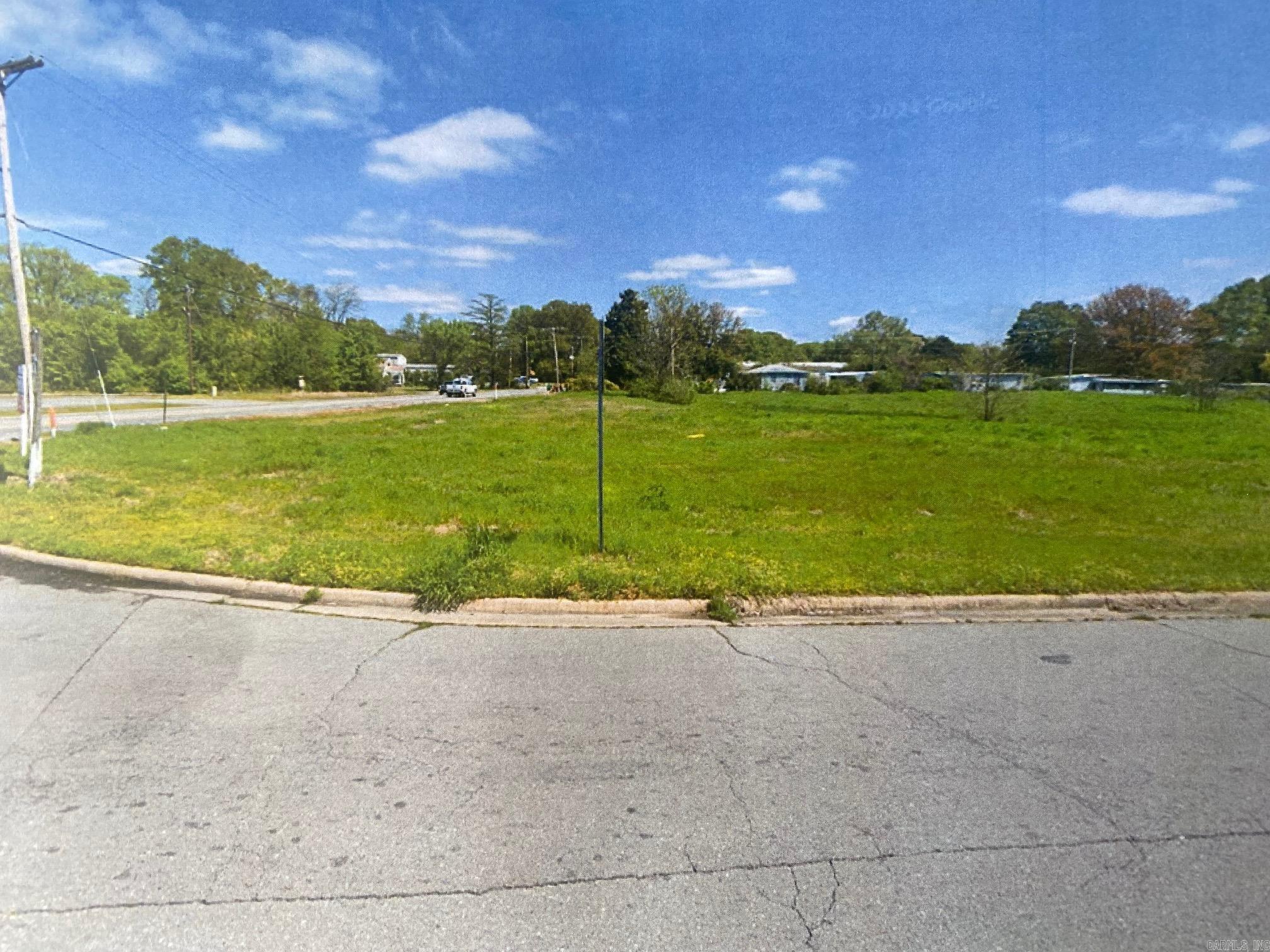 Excellent Commercial property at the East end of McCain Blvd. in Pulaski County, Ar. This property offers hard corner sites for Retail, Hotel and Fast Food locations along with Commercial Distribution and Office Warehouse possibilities.  Sewer, water and electricity and gas are available to the site and the Seller will subdivide the property for purchaser's use.  Located in Pulaski County outside the NLR City Limits, this property is without zoning classifications.
