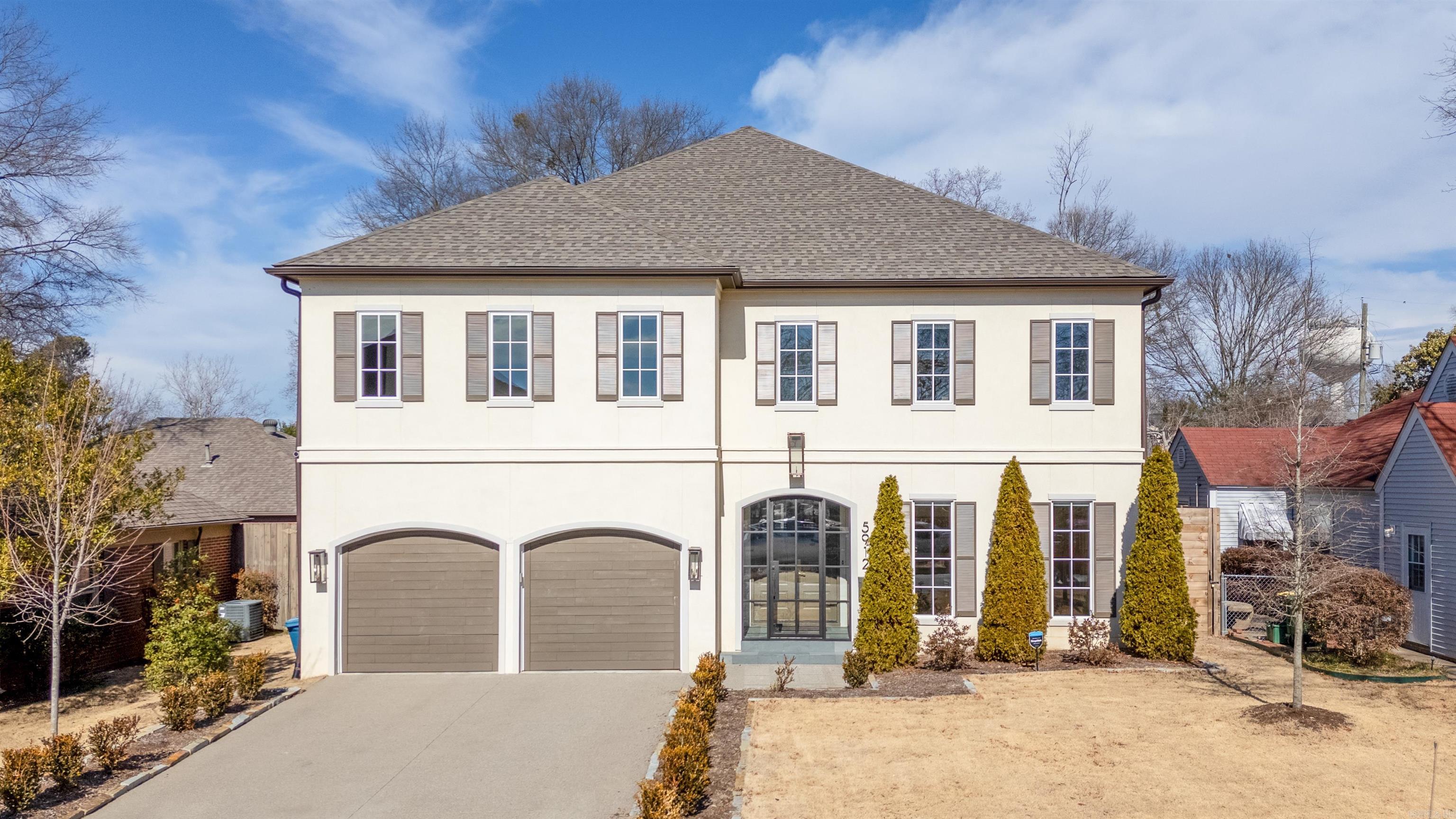 Experience the best of Heights living in this stunning home with a fabulous layout designed for comfort and luxury. The living room boasts a twenty-foot coffered ceiling and Marvin bi-fold doors leading to a covered veranda. The gourmet kitchen features high-end appliances, a gas cooktop, ice machine, walk-in pantry, beverage fridge, and a 120-bottle wine fridge. The spacious dining room is perfect for hosting gatherings. The primary bedroom offers a gas fireplace and sitting area, with a spa-like bathroom that includes a walk-through shower and soaking tub. The expansive primary closet leads to a workout or office space and connects to the laundry room. Upstairs, find three bedrooms with en-suite baths and a huge bonus room suitable for a media space and play area, complete with a beverage fridge and sink. Each level has a half bath for guests. Additional features include automatic blinds downstairs, a Phantom Screen on the veranda, an EV charger in the garage, and elegant glass doors on the front porch. This home offers the finest in Heights living.