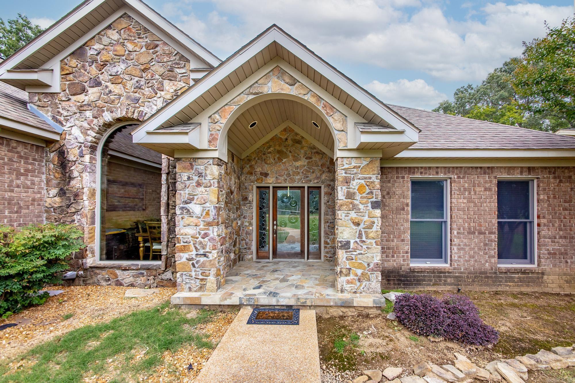 Lake days, family nights and effortless entertaining start here. This Eden Isle retreat sits along the golf course just minutes from the marina and Greers Ferry Lake, with 4 bedrooms and 3 baths spanning 2,632 sq ft. An airy, open living space leads to a secluded back patio—perfect for morning coffee, weekend cookouts, and quiet evenings. Nestled in a friendly neighborhood, it offers the space you want and the lifestyle you’ve been looking for. Tour it today. *DISCLOSURE: Listing includes AI generated virtual staging and/or digital photo enhancement.*