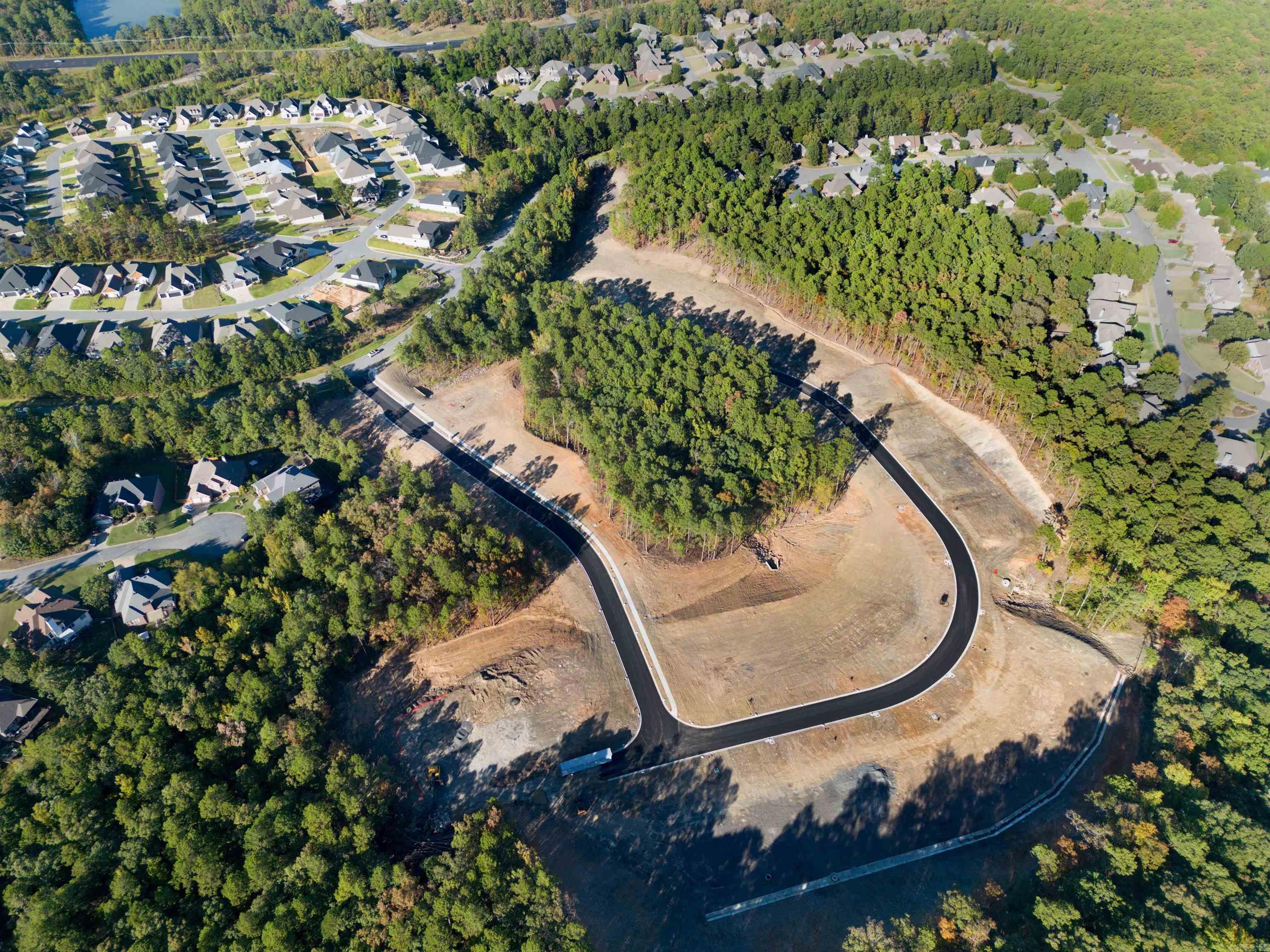 The location you've been waiting for is now available in Calion Court, off Chalamont drive near Chenal Parkway in West Little Rock.  Here you get a beautifully developed neighborhood with natural scenery and walkable streets, plus convenient access to Chalamont Park, retail, restaurants, schools and more.  This is where you want to live!