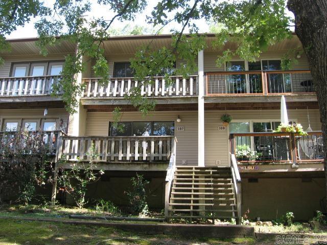 SELLER WILL CREDIT UP TO $3500 to Buyer toward updates and/or closing costs!!!!  TAKE A LOOK AT THIS GREAT, UPDATED CONDO WITH 2 BEDROOMS AND TWO  BATHROOMS!!!  It's turnkey with all appliances, kitchen items, furniture, decor items, linens included.  Kitchen has new wood cabinets and quartz countertops, stainless refrig/freezer.  Both bathrooms are updated, and lower bath has a shower!!  Flooring is LVP and carpet.  Nice furniture -- K & Q beds, Q sleeper sofa.  All new interior doors,  barn door to conceal laundry center, fans and light kits.  HVAC replaced in 2017.   Ask about the Resort Membership dues and service fees for sewer, garbage service, etc.  BUYERS:  take advantage of this awesome property for residence, and fun getaway, or as a rental.  Very near the Cool Pool & Cafe, tennis/pickleball courts, plus other amenities are walking distance or an easy drive.  Price is a GREAT VALUE, plus a CREDIT at closing for costs.  Call today to see!!  Agent Remarks are a MUST prior to showing!!!!!!!!!!!!!!!!!