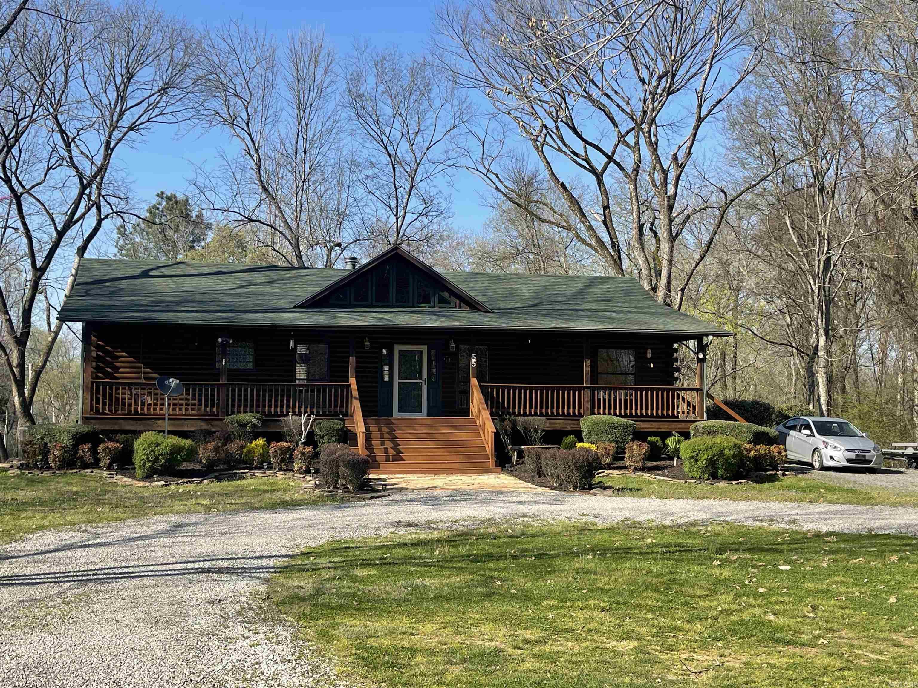 Beautiful log home located close to the River and Golf Course.  Just minutes from Greers Ferry Lake.