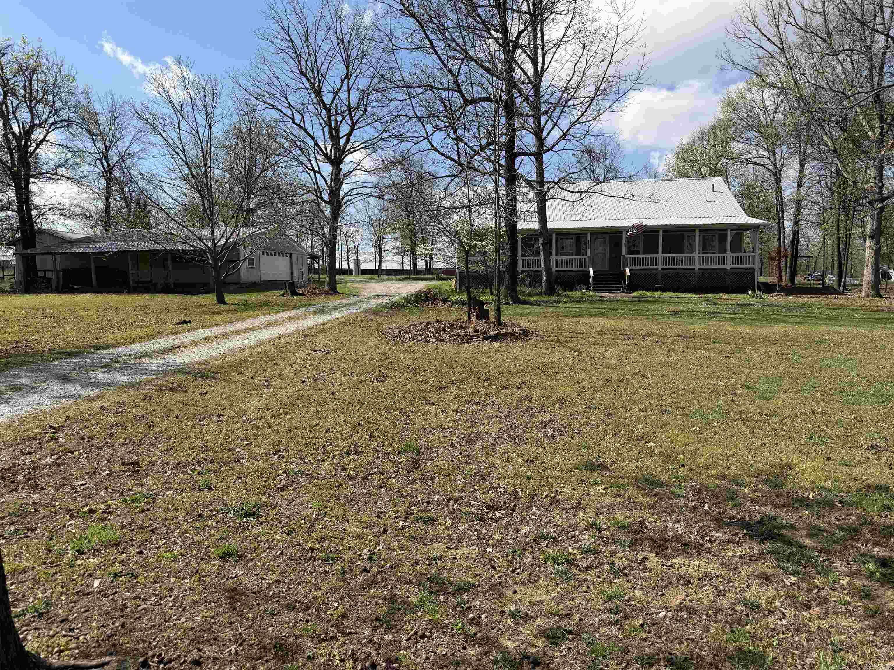 For Sale, Very nice Home and 9.8 acres, minutes from Batesville AR  and Greers Ferry Lake. This 3,200 sq. ft. dwelling features Hardy plank cement board siding, large attached carport, engineered hardwood flooring, an updated kitchen with stainless appliances ,and farm sink.  4 large bedrooms, three baths, a spacious front porch and a sunroom on the back with mini-split H/A and wood heat.  It features a great garden area with water, a shop, storm shelter, and a pond.  Great for horses, goats and chickens!  Must see to appreciate.