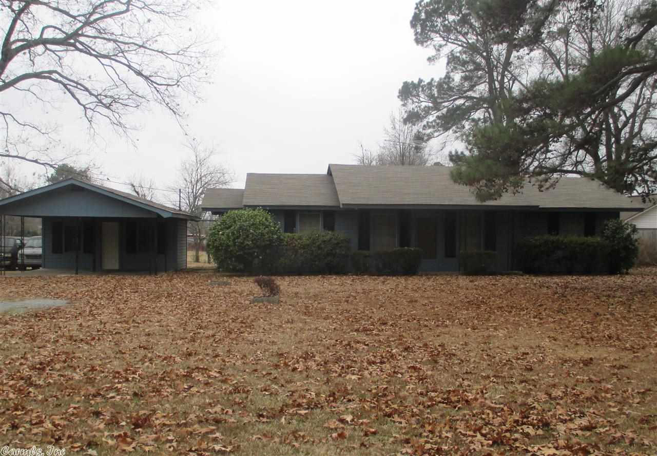 Great home on a large lot.  Detached carport with outside storage/shop.
