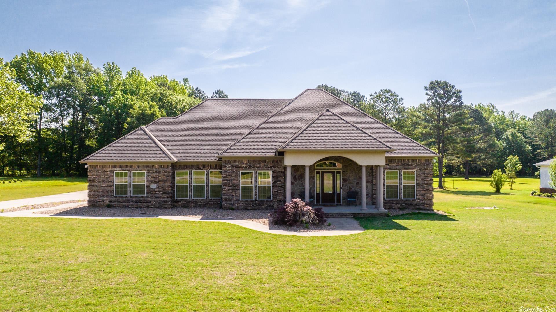 Beautiful home on two acres! This 4 bedroom 3 bath home has it all! This is perfect for your family! The Kitchen has granite counters, gas cook top, and tons of stained cabinets. Great family room! Sunroom/workout room/ offiice! The master bedroom is awesome with a master bath and closet to die for. Bonus room has a full bath. All bedrooms are big. Home has tons of storage! Heated In-ground salt water pool! Covered back porch. FOUR CAR GARAGE! Plug in for an RV. All of this in a great neighborhood on two acres! Call today! This won't last.
