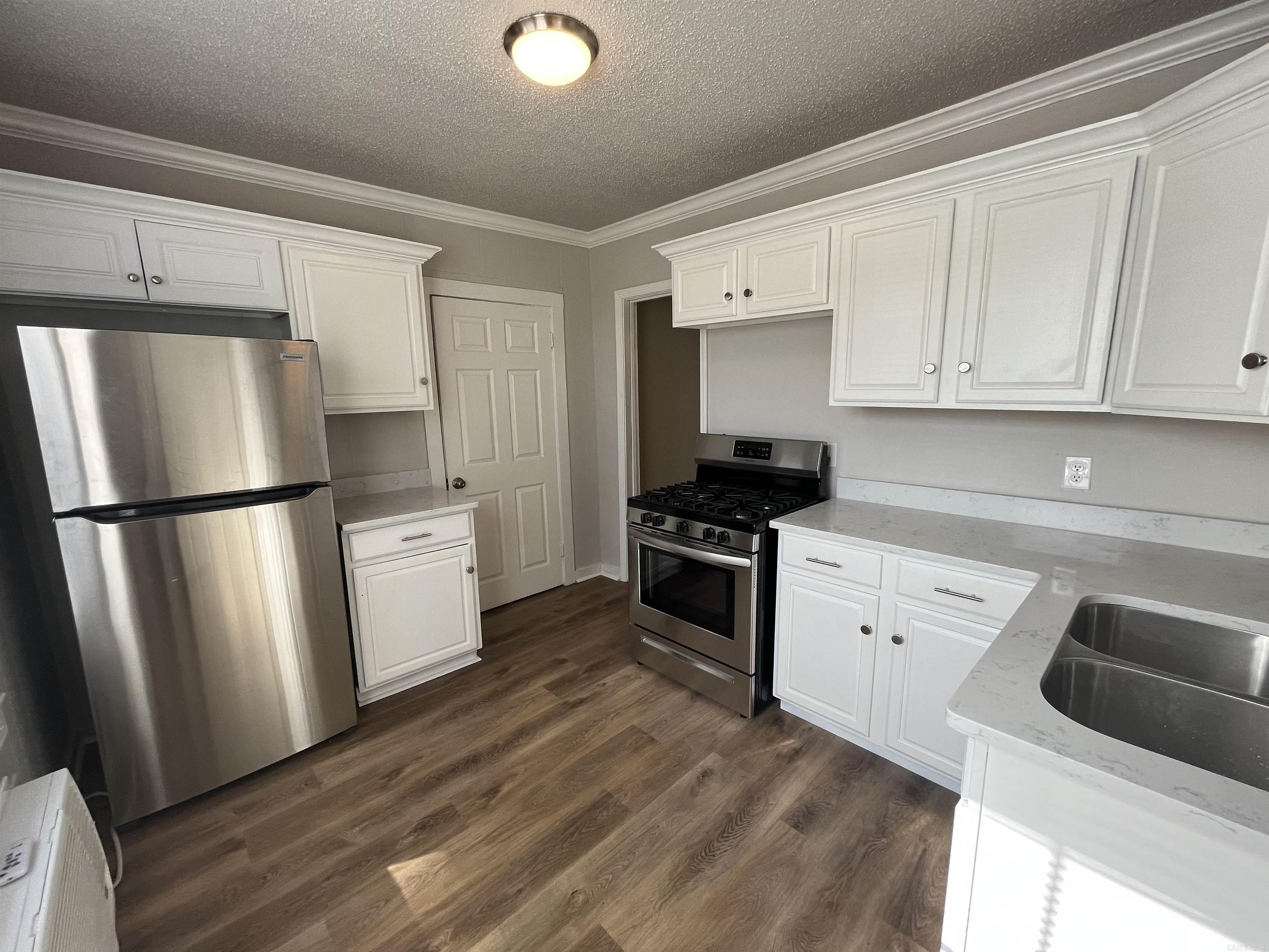 Completely remodeled one bedroom, one bath apartment. New appliances with a gas range. Beautiful quartz countertops in the kitchen and new flooring throughout.  Parking on premises. $65 monthly for water. Deposit same price as rent.