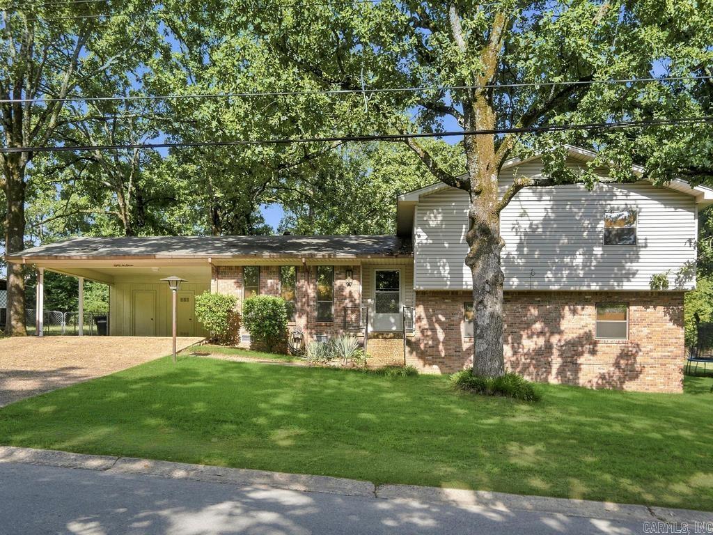 Tri-level , flexible floor plan with versatile bonus room that can easily serve as a fourth bedroom, excellent storage throughout home. Outside enjoy the large backyard, perfect for gardening, or relaxing. The covered back porch provides a comfortable outdoor retreat and includes an ideal space for entertaining or creative workspace. The backyard also includes a spacious storage shed with electricity, offering endless possibilities for a hobby space, or additional storage. Park Ave. is a prefect blend of comfortable living and close to town.