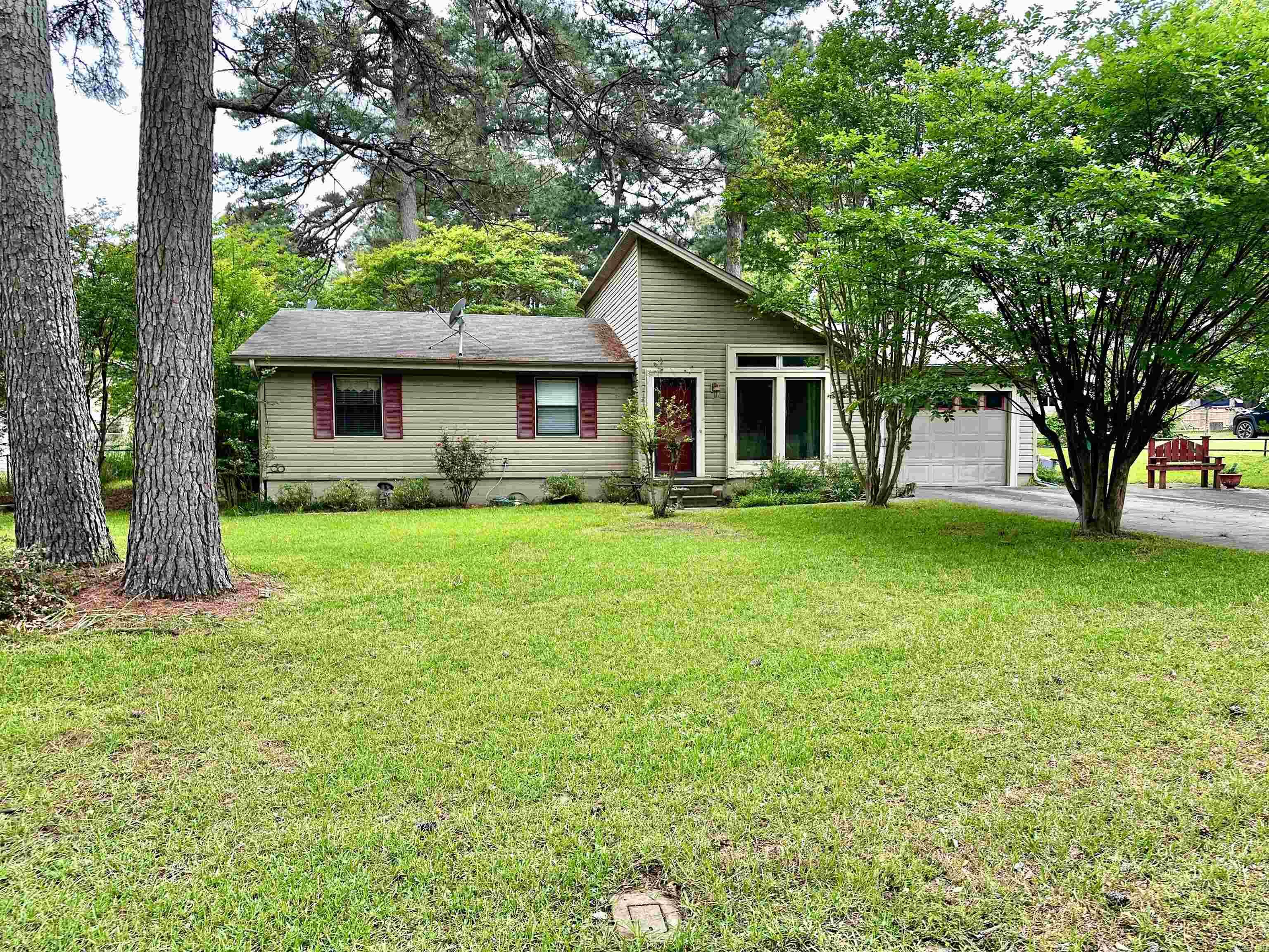 This Cottage on East St. is warm and inviting. It also offers a modern design with a vaulted ceiling in the Living Room, Kitchen and Dining areas. 3 bedrooms and 1.5 Updated baths make for a cozy home. Whether a first time buyer or someone ready to downsize, this Home is perfect. It has a one car attached garage and large fenced in backyard. The beautifully landscaped yard invites you to spend time on your covered patio. There is also a large outdoor storage building. Whether starting a family or downsizing before retirement, this home is waiting for you!