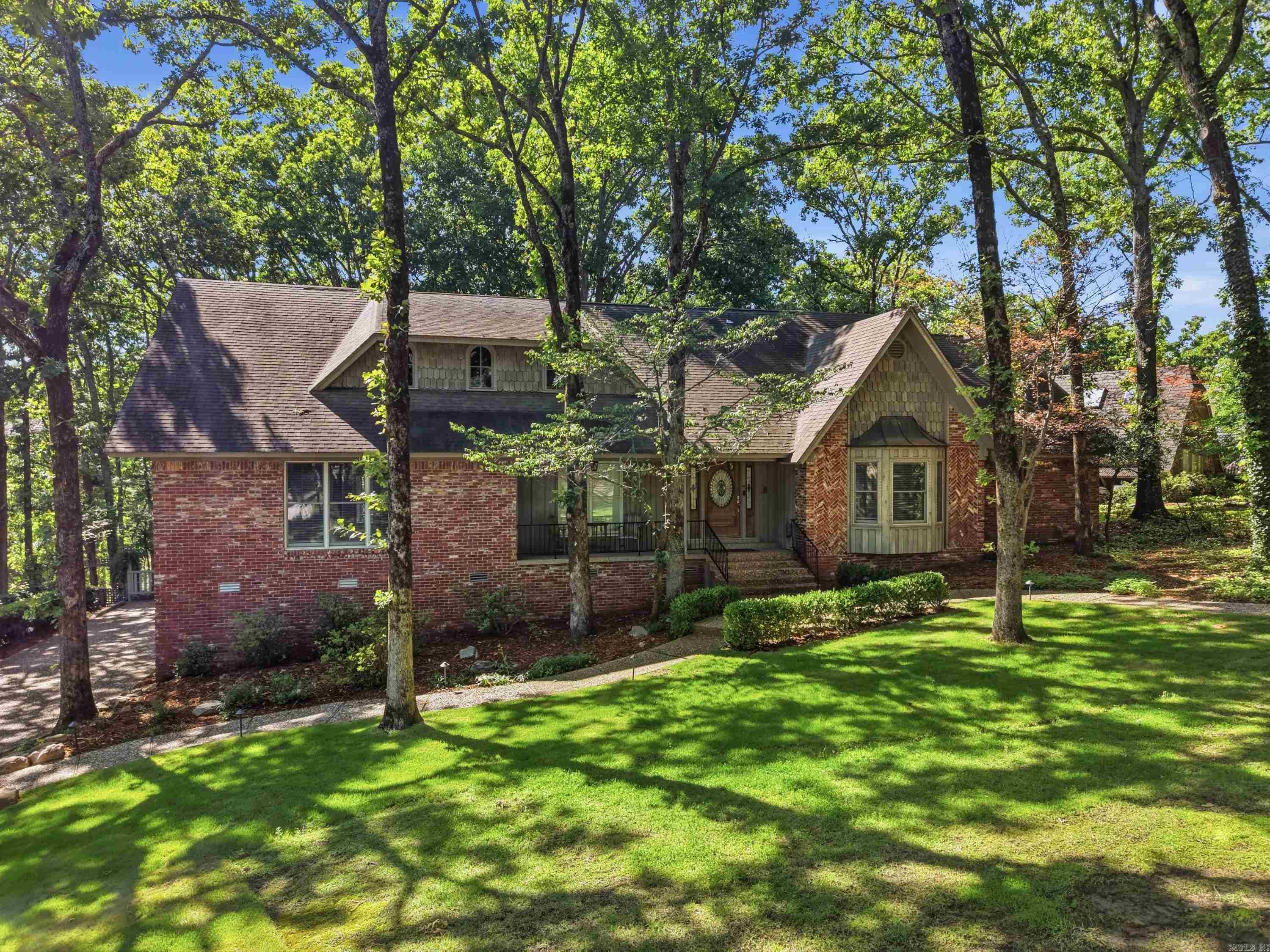 Nestled in the highly sought-after Shady Valley neighborhood of North Little Rock, this stunning 5-bedroom, 3.5-bath home at 3 Cherry Tree offers the perfect blend of elegance, comfort, and natural beauty. Backing directly to peaceful 5 Mile Creek, the property provides a rare private setting with scenic views and mature surroundings. Inside, you’ll find fresh paint, soaring vaulted ceilings, and inviting living spaces designed for both everyday living and entertaining. Filled with timeless character and warmth, this home combines style and functionality in one of NLR’s most established and desirable neighborhoods. Enjoy the convenience of a prime location paired with the tranquility of a creekside setting — a rare opportunity buyers won’t want to miss. I encourage you to view the additional video and virtual tour.