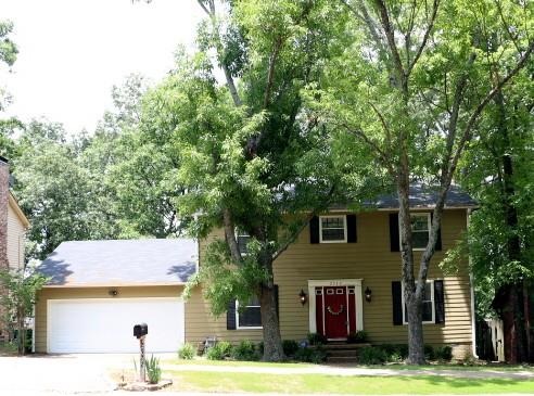 Two story traditional house on a large lot.  4bdrms all upstairs with two full baths and a half bath downstairs.  Formal dining room and large family room with fireplace and built ins.  Kitchen is remodeled and has appliances dated 2009.  New roof and hvac!  See agent remarks