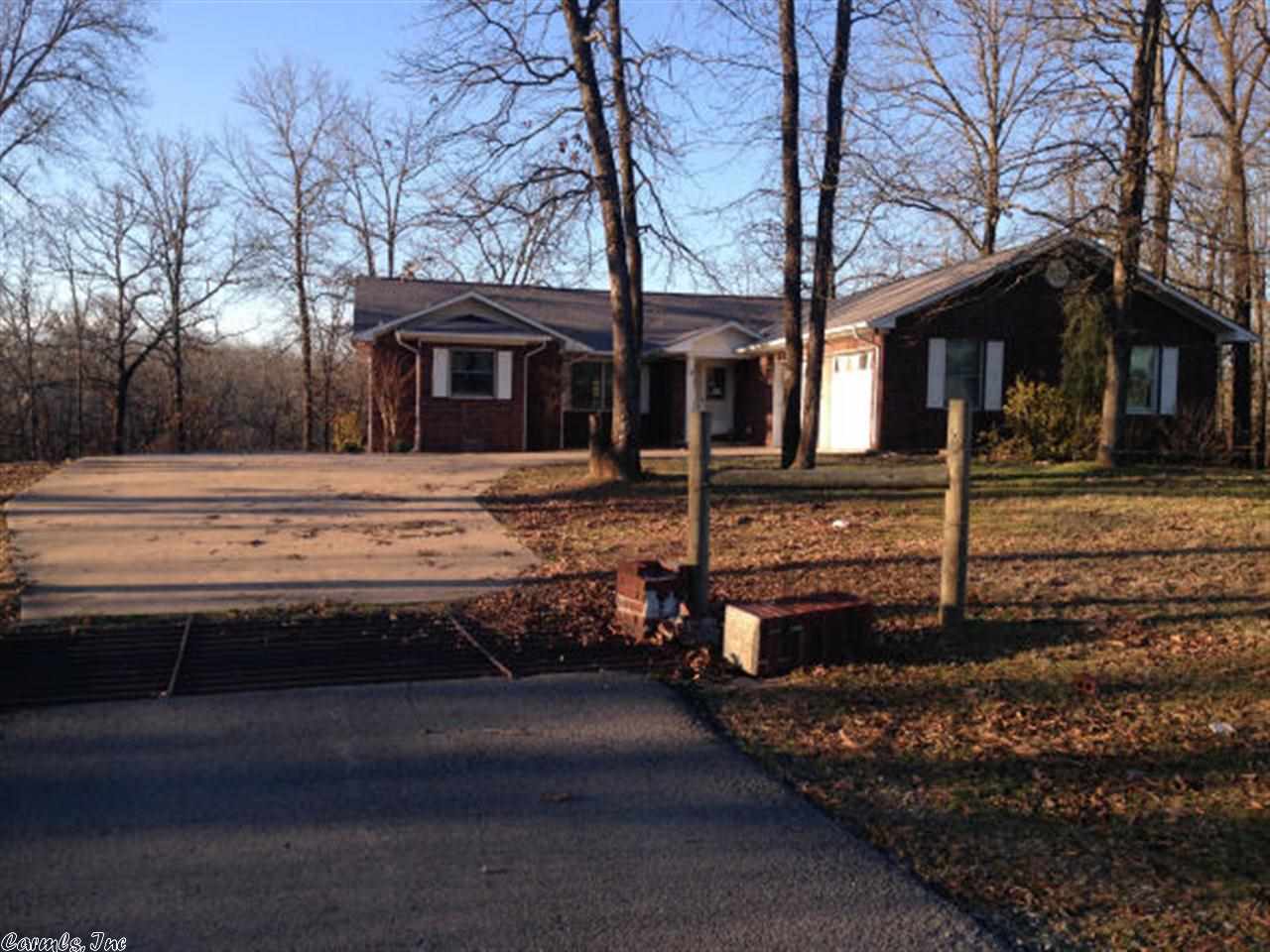 Enjoy your privacy in this house with a large open living, dining, and kitchen area. Spacious master bedroom that opens to deck in back. Large outside workshop. Private drive to house. Enjoy the deer and wildlife from the Sunroom or deck. Repair and reap the benefits of this country home.  Seller will consider all offers on this property.