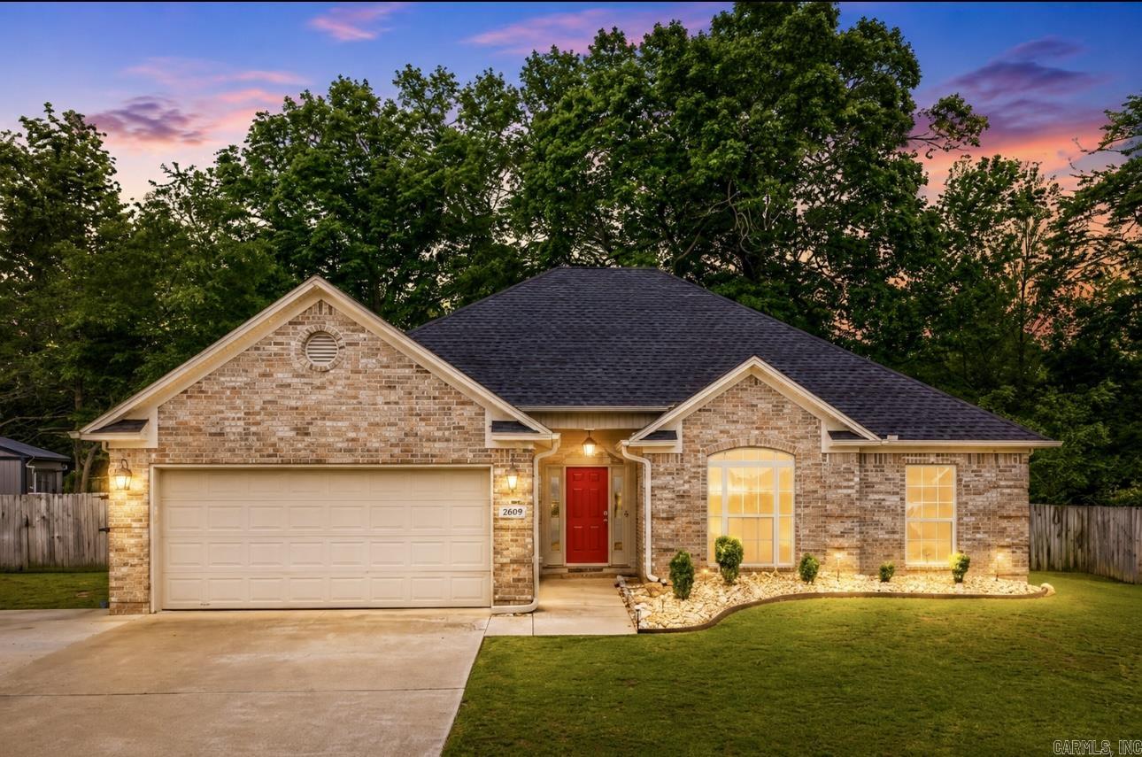 Stunning home w/flexible layout in a highly desirable neighborhood—NEW ROOF! Offering 4 bedrooms or 3 bedrooms plus a large upstairs flex space w/its own full bath,ideal as a game room,theater,guest suite or private living area.Conveniently located just 10 minutes from Bass Pro &minutes from I-30 interstate.Recent updates include a modern “Floating”multi-color electric fireplace,quartz countertops,subway tile backsplash,stainless appliances,updated lighting,fresh paint &new flooring in main living areas,wood beams upstairs,23 recessed lights,an updated laundry room w/added cabinetry &floating shelves,added attic insulation(including insulated pipes)gutters,generator outlet & 30-amp RV plug.Home also offers an extra parking pad &a drive-through gate providing backyard access to the storage /sheshed/man cave.Enjoy the huge private backyard backing to green space,an approx 7’x15.5’ covered porch &a spacious approx 35’x16’ uncovered patio.Move-in ready w/space,style & versatility for today’s lifestyle!