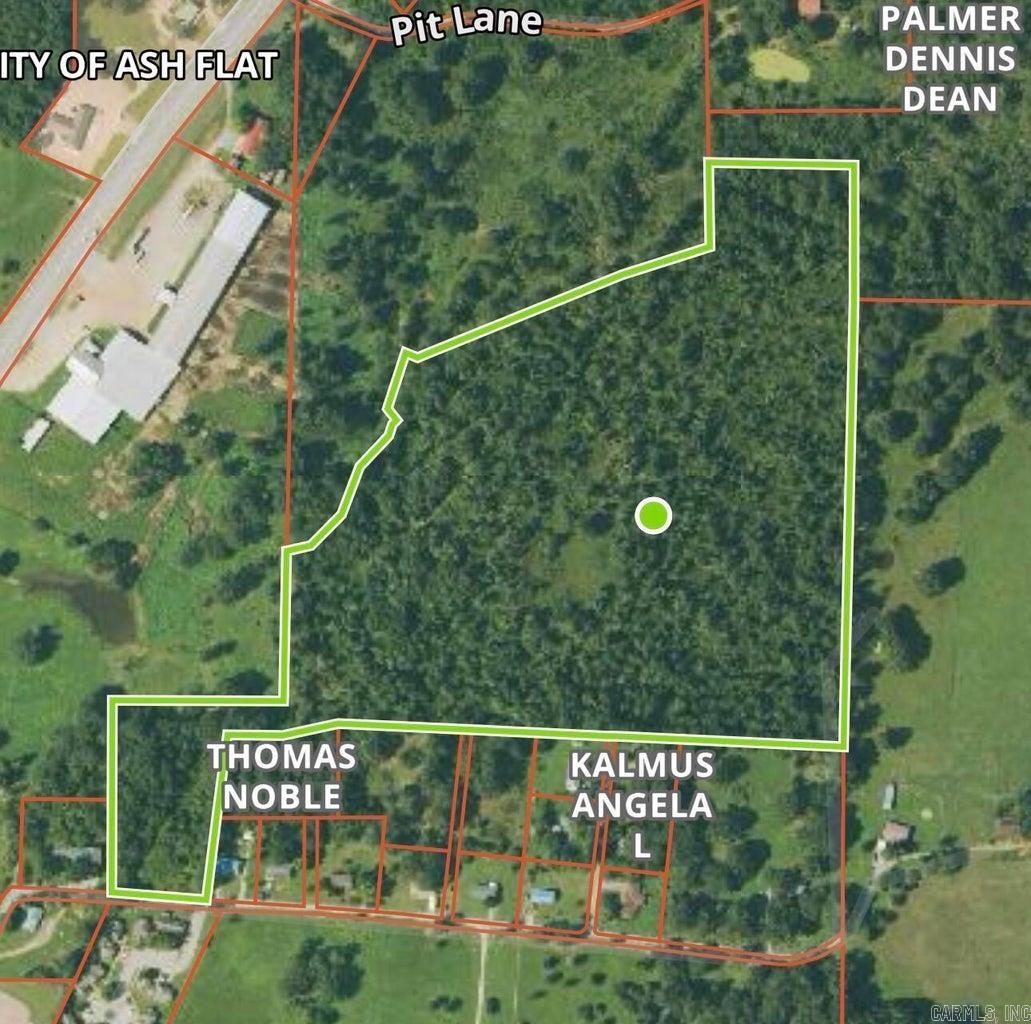 Rare opportunity to own 33.25 beautiful acres located within city limits, offering the perfect blend of convenience and country living, sacrificing the convenience of city living. With access to city water and sewer, this property is ready for your dream home, family compound, or future development. The land features several cleared areas ideal for building, along with plenty of open space for recreation, farming, or livestock -- yes, livestock are allowed! A peaceful pond adds charm and provides a scenic backdrop for your homesite or outdoor enjoyment. Situated just off a paved street, the property offers easy access while maintaining privacy and room to spread out. Whether you're looking to build now or invest for the future, this versatile acreage provides endless possibilities.