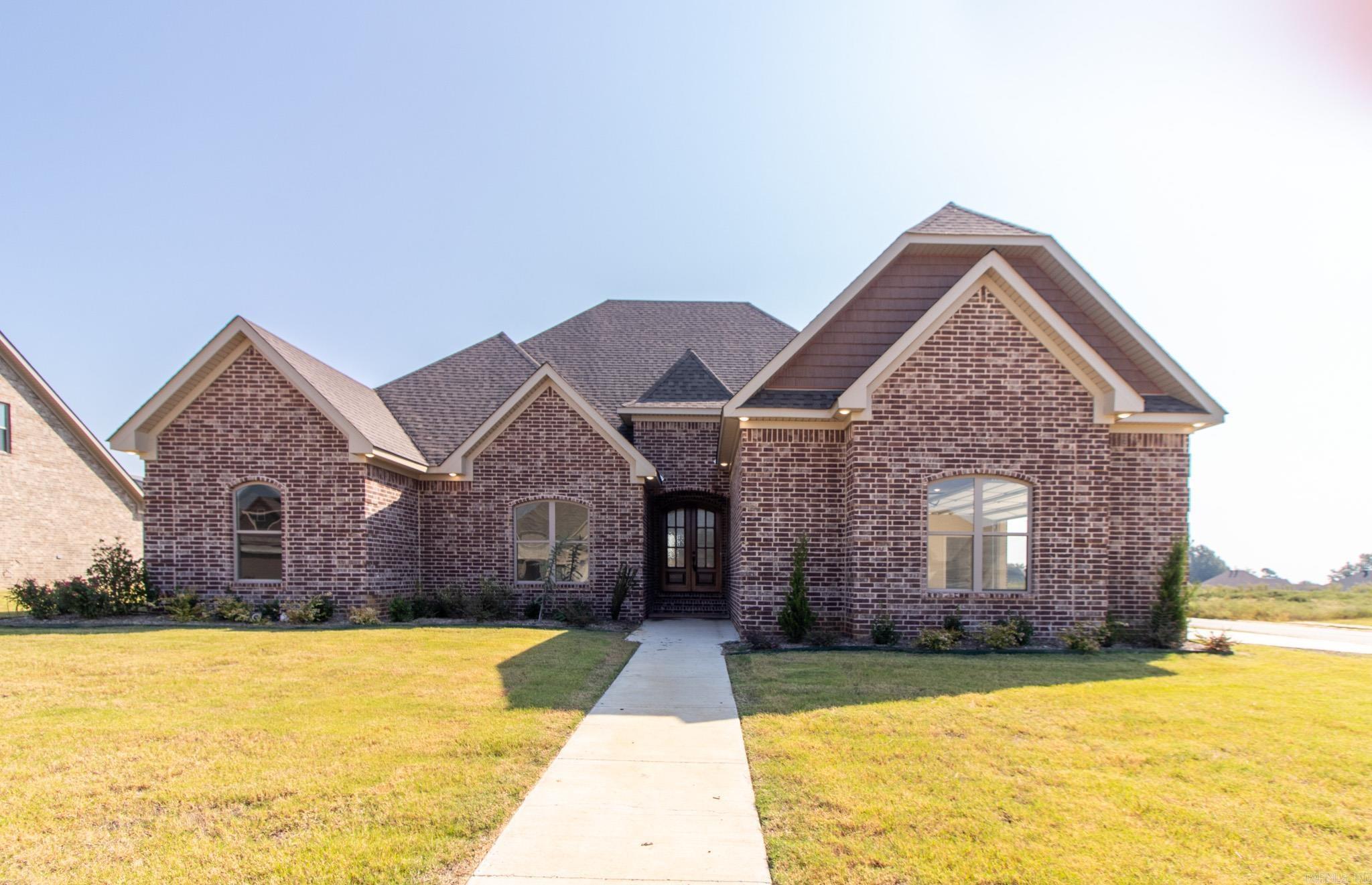 Looking for a stunning home in a desirable location!  Look no further than this home in the Whispering Hills Subdivision!  The quality is in the details.  This home uses foam insulation for a smart choice for energy efficiency, as it helps to seal the home from outside air and prevent heat loss in the winter or heat gain in the summer. The attention to detail in the trim work and custom cabinets points to a high level of craftsmanship and quality materials. Premium countertops will be used throughout this home in the kitchen and all three full bathrooms.  With it's open floor plan and five spacious bedrooms, this new construction has the space to not only provide a comfortable and enjoyable living experience, but can also add value to the property in the long term.  Call today to schedule your private tour.