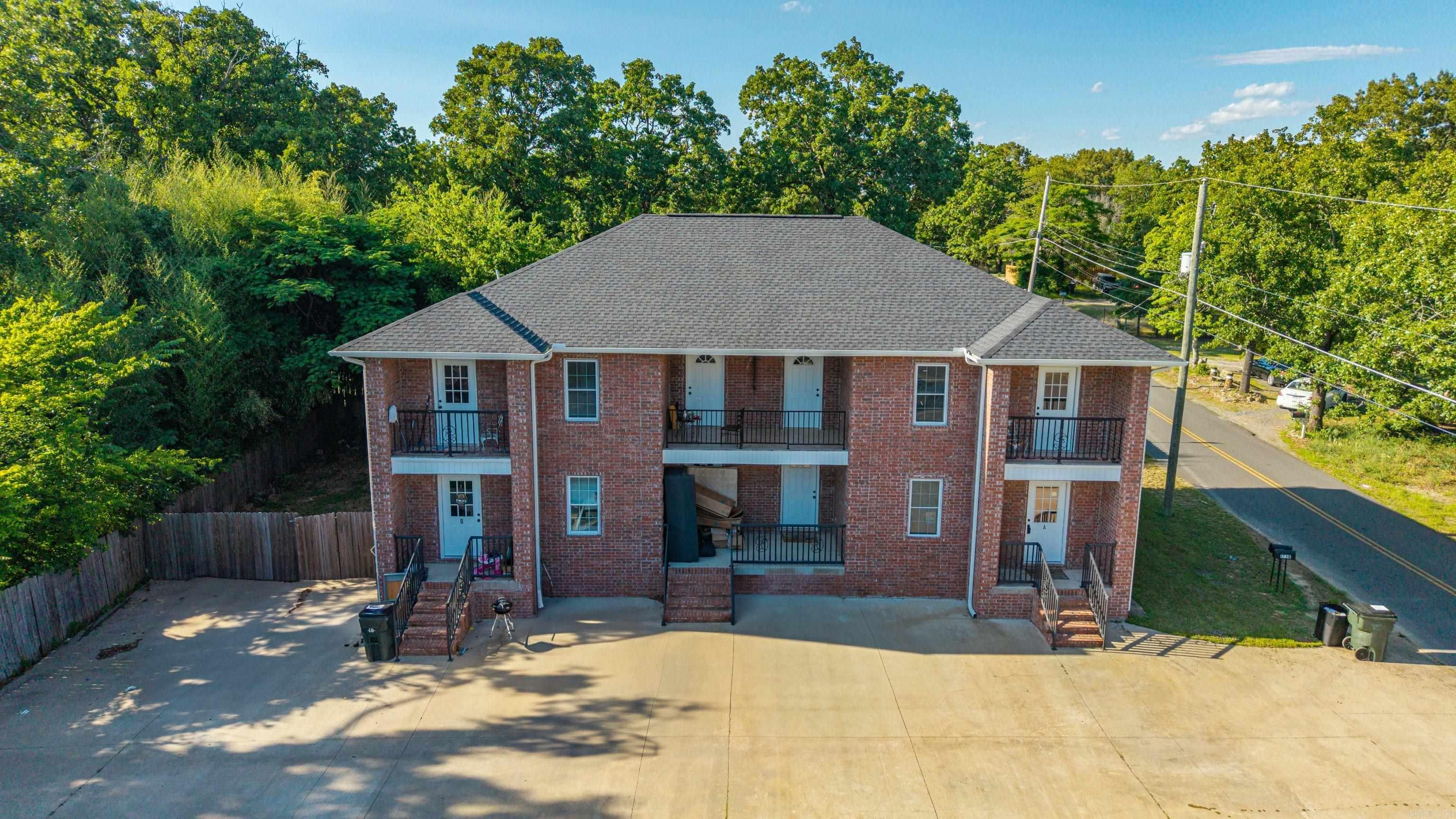 Modern, stylish, & income-producing — this updated duplex located at 173 Hershell Road is a rare turnkey opportunity outside city limits with flexibility for long-term or nightly rentals. Each unit features 4 bedrooms, 2 full baths, and 2 half baths, offering spacious layouts designed for comfortable living and strong rental appeal. Thoughtfully renovated with today’s buyer & renter in mind, the property features updated flooring, fresh modern paint selections, refreshed kitchens with beautifully updated cabinetry, upgraded bathrooms with new vanities and toilets, updated lighting and fixtures, new exterior doors, and appliances included. Major system upgrades include a newer roof installed in 2023 and a brand-new HVAC system in 2025, offering both style and peace of mind. Both units are currently occupied, providing immediate rental income and making this an excellent turnkey investment opportunity. Whether you’re looking to expand your investment portfolio or searching for a high-performing income-producing property, this duplex offers versatility, modern updates, generous living space, and turnkey convenience all in one.