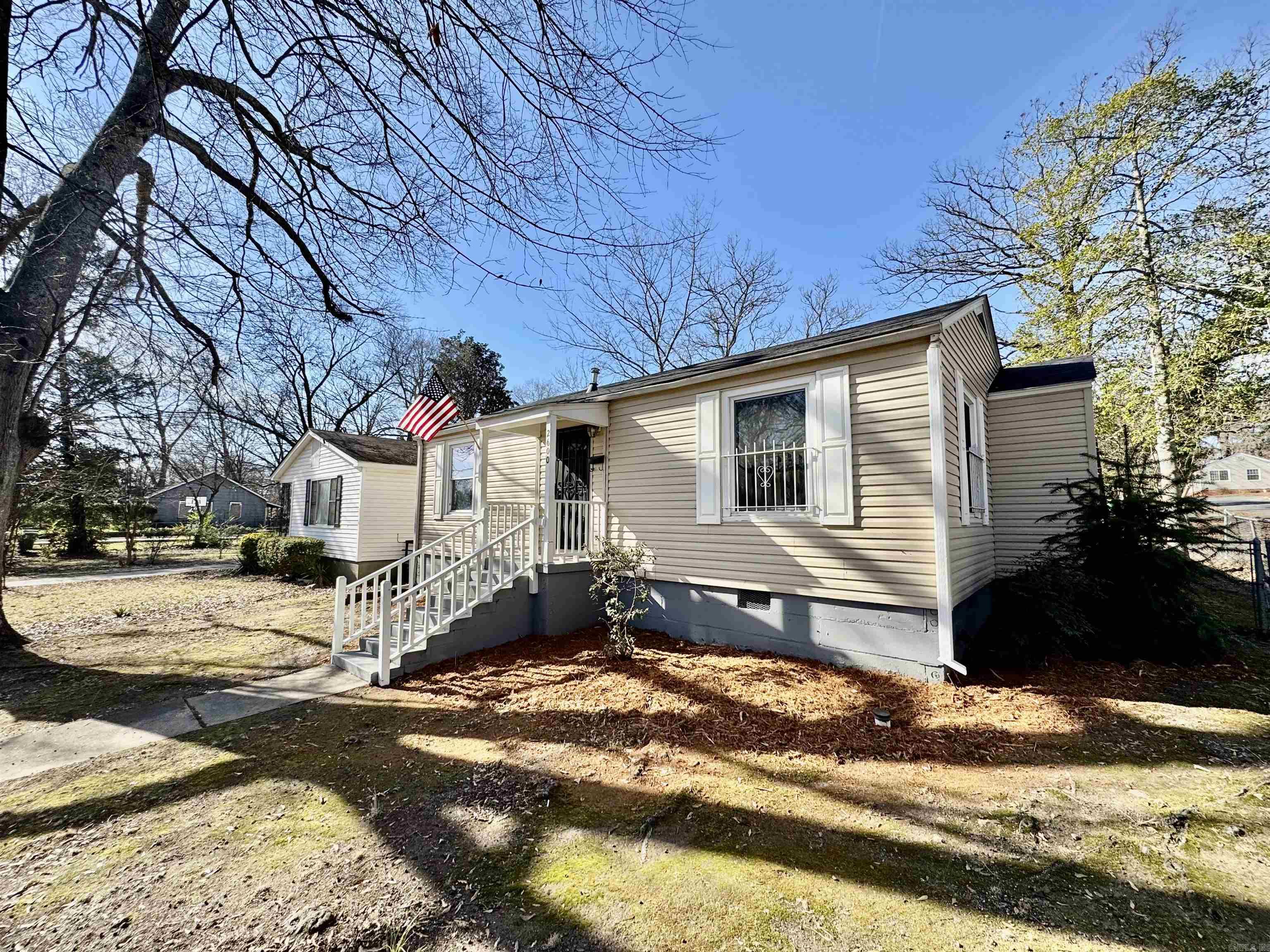 Welcome to this great 3 bedroom 1 bath home on a corner lot conveniently located. It features hardwood floors, updated paint, updated counter tops including a butcher block bar. The home has a carport, 2 living rooms with built ins. Being on a corner lot also gives this home a great sized backyard!