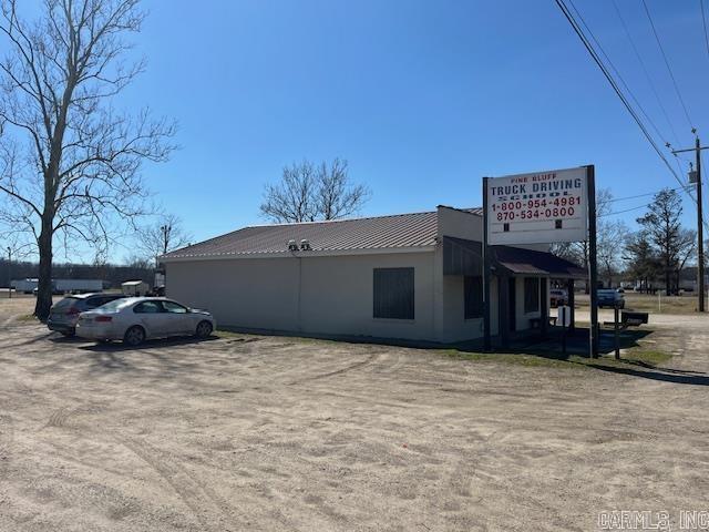 Established CDL Training Academy with Prime Real Estate and Multiple Income Streams in Pine Bluff, AR 4208 Highway 65 South, Pine Bluff, AR Overview: Discover a rare investment opportunity in Pine Bluff, Arkansas, featuring a well-established CDL training academy paired with extensive real estate assets. With the current owners retiring, this unique property not only operates as a profitable educational institution but also includes multiple income-producing rental houses and a 10-acre mobile home park that can be included if the buyer desires. This offering represents a lucrative business model with substantial revenue potential. Additionally, the academy features on-site male and female dormitories, catering to students' needs and enhancing enrollment potential. In addition there is a large pond with functioning  well and pump that could be used for a wet yard. Financial Information Comprehensive financial details, including current rental income and academy revenue, will be available to serious buyers upon request. This is an excellent opportunity to achieve a fast return on investment through multiple streams of income. Pre-approval letter will be required to view the property.